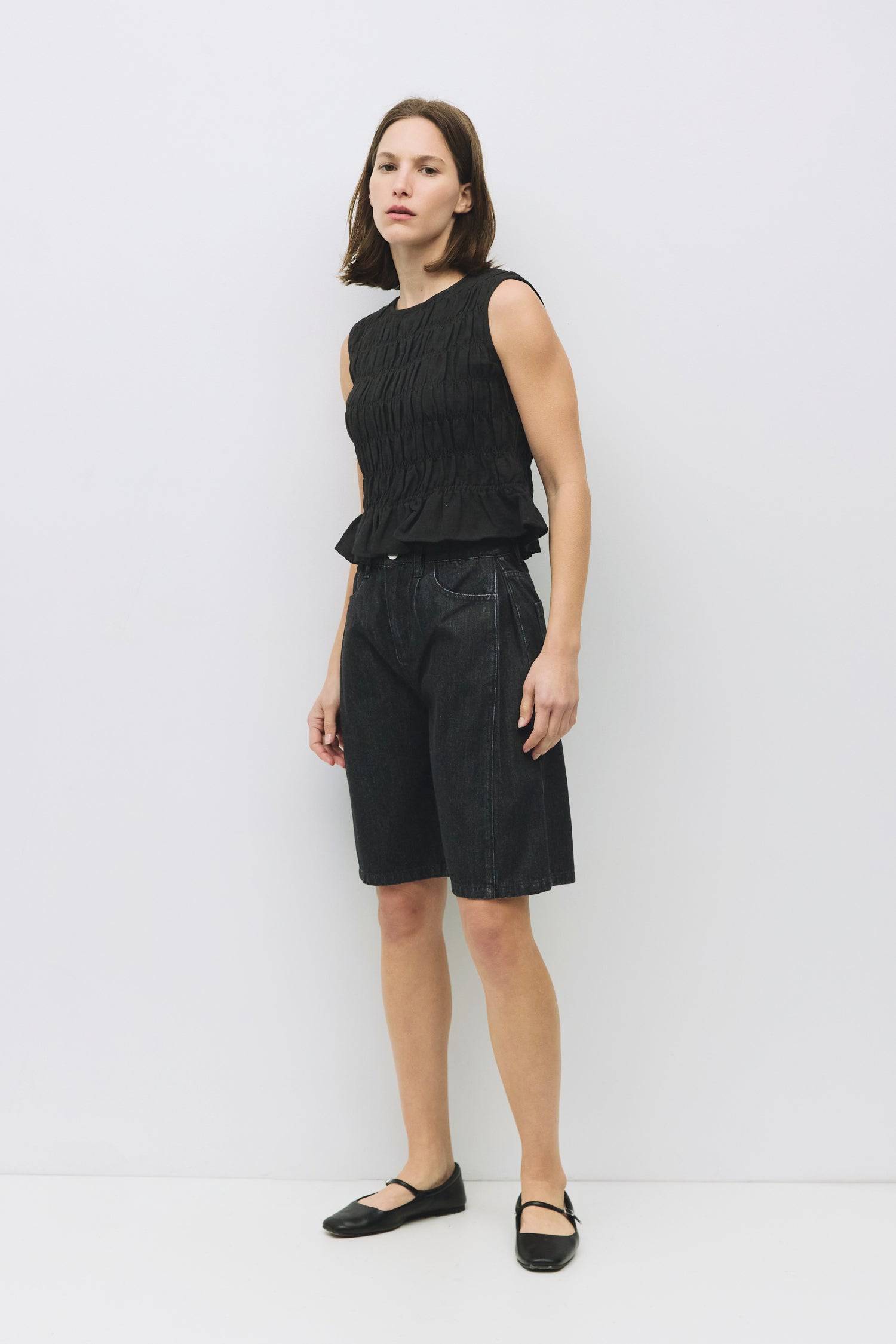 8954058146013, The Florencia Top, Tops, All Row, All Row,allrow,Black,Casual,cf-color-black,cf-color-white,cf-color-yellow,cf-size-l,cf-size-m,cf-size-s,cf-vendor-all-row,cinched,final-sale,finalsale,new,Red,Ruffles,sale,set,Sets,Spring,Summer,texture,white,Women's,womens top, Information The Florencia Top is a sleeveless smocked linen piece with a high neck and a keyhole back with a button closure. Its smocked front and back, plus a playful bottom ruffle, create a relaxed, cropped fit that’s perfect for th