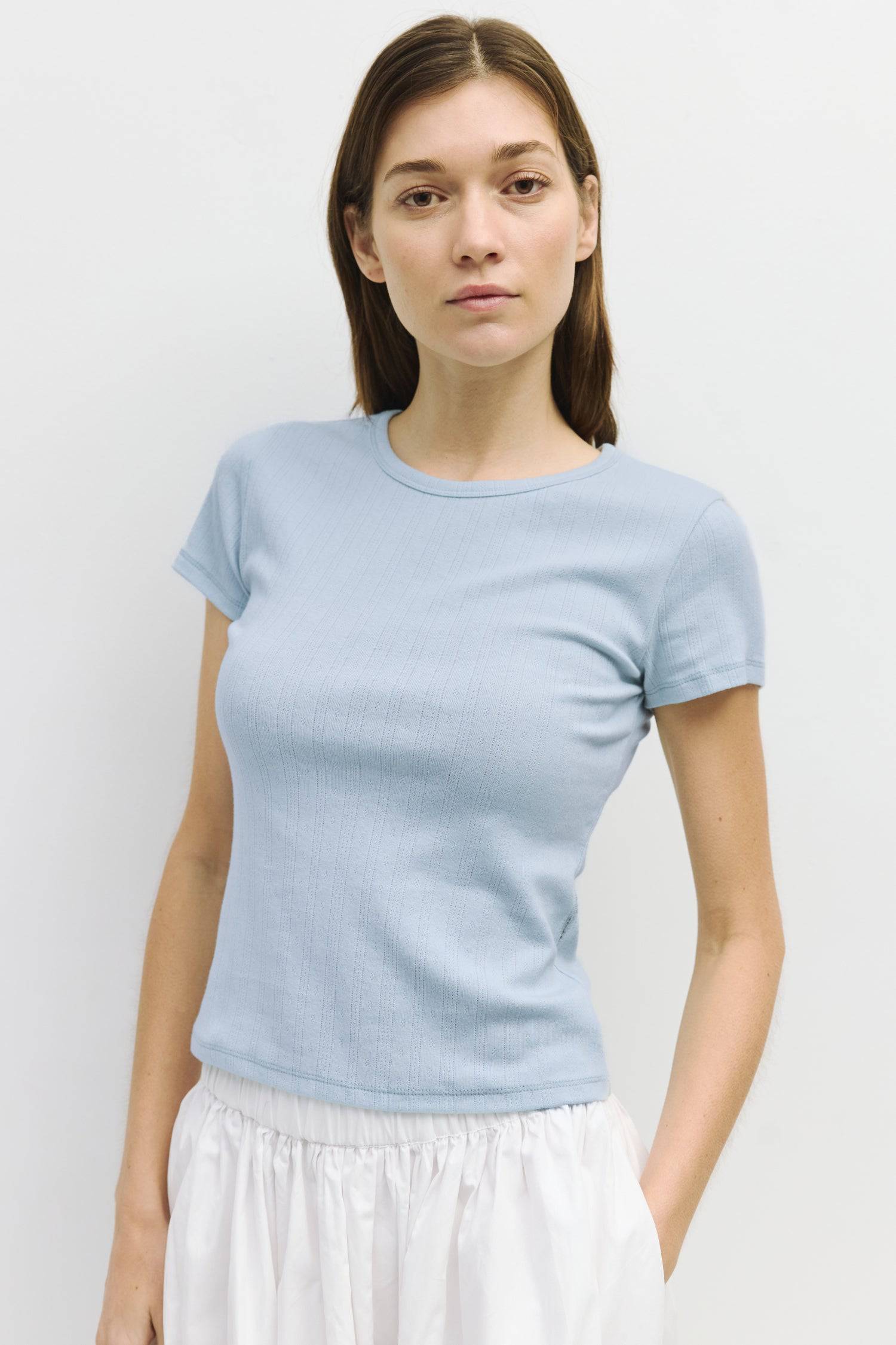 8929243955421, The Deborah Top, Tops, All Row, 90s,Basic,Basics,Black,Blue,Casual,cf-color-blue,cf-color-sage,cf-color-white,cf-size-l,cf-size-m,cf-size-s,cf-vendor-mod-ref,Comfortable,Crew Neck,Crew Neckline,Everyday,final-sale,finalsale,Form Fitting,pointelle,Ribbed,Ribbed Fabric,Ribbed Top,Sage,sale,Short Sleeve,Spring,stretch,Stretchy,Summer,Tee,Tops,Transitional,white,Women's, Information The Deborah Top is a fitted baby tee made from soft pointelle knit fabric, featuring a classic crew neck and short