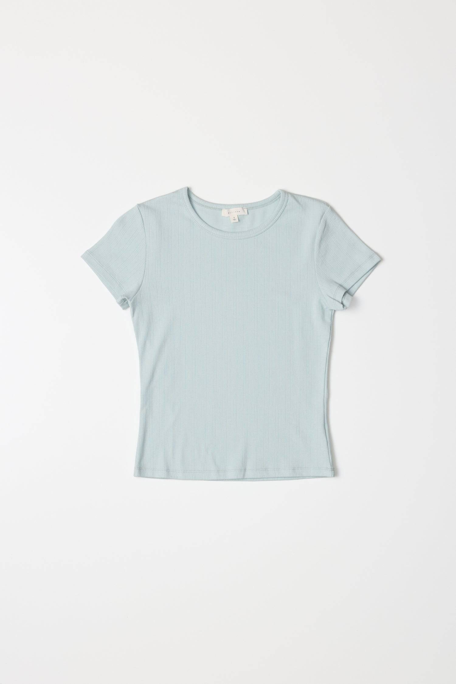 8929243955421, The Deborah Top, Tops, All Row, 90s,Basic,Basics,Black,Blue,Casual,cf-color-blue,cf-color-sage,cf-color-white,cf-size-l,cf-size-m,cf-size-s,cf-vendor-mod-ref,Comfortable,Crew Neck,Crew Neckline,Everyday,final-sale,finalsale,Form Fitting,pointelle,Ribbed,Ribbed Fabric,Ribbed Top,Sage,sale,Short Sleeve,Spring,stretch,Stretchy,Summer,Tee,Tops,Transitional,white,Women's, Information The Deborah Top is a fitted baby tee made from soft pointelle knit fabric, featuring a classic crew neck and short