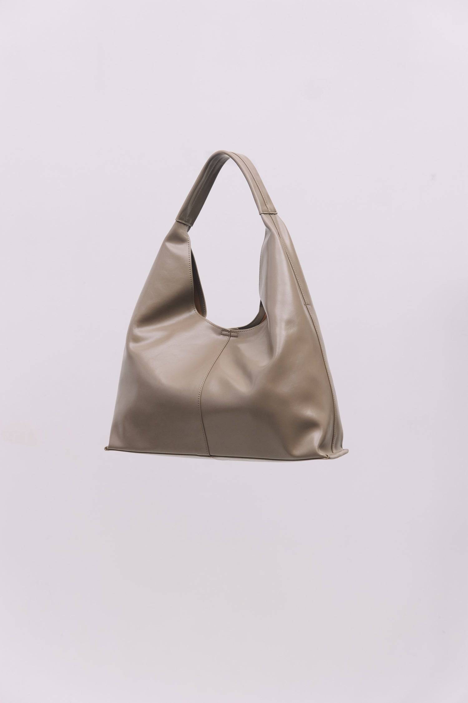 8989083599069, The Cosani Bag, Bags, Mod Ref | Common Market, accessories,bag,bags,cf-color-khaki,cf-color-white,cf-vendor-mod-ref-common-market,dark brown,modrefcommonmarket,Oversized,purse, Information The Cosani Bag is a medium-sized, slouchy patent leather bindle bag with a front seam detail and integrated patent strap. Features a magnetic button closure, flat bottom for structure, and a removable makeup or coin purse for added convenience. Details 100% Cowhide Slouchy Shape Magnetic Button Closure Remo