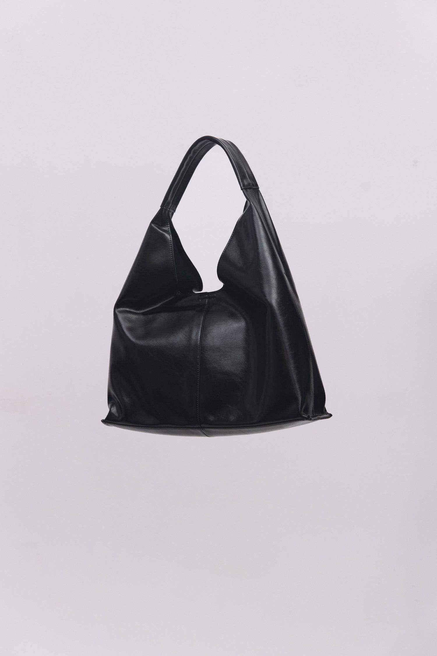 8989083599069, The Cosani Bag, Bags, Mod Ref | Common Market, accessories,bag,bags,cf-color-khaki,cf-color-white,cf-vendor-mod-ref-common-market,dark brown,modrefcommonmarket,Oversized,purse, Information The Cosani Bag is a medium-sized, slouchy patent leather bindle bag with a front seam detail and integrated patent strap. Features a magnetic button closure, flat bottom for structure, and a removable makeup or coin purse for added convenience. Details 100% Cowhide Slouchy Shape Magnetic Button Closure Remo