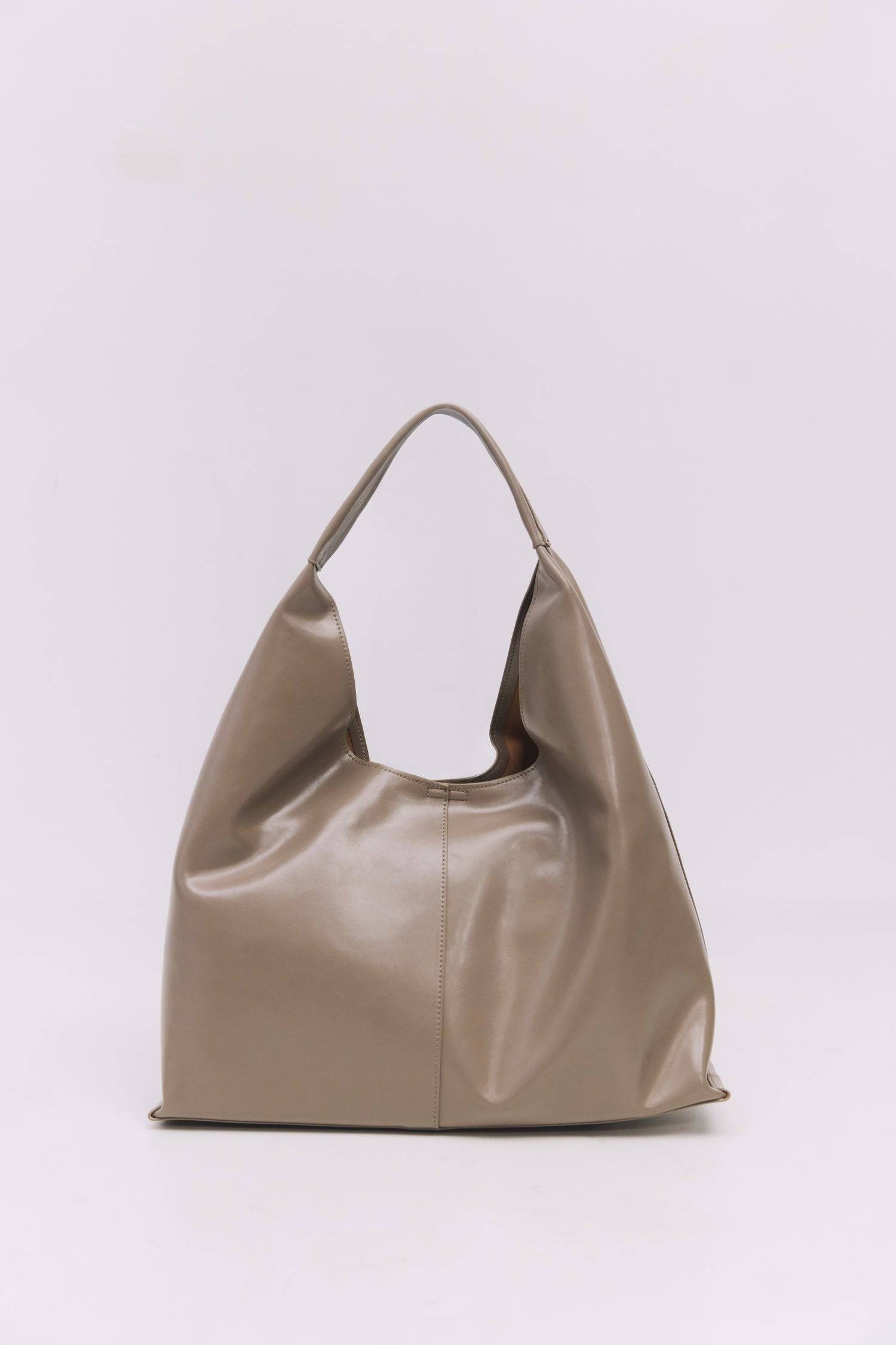 8989083599069, The Cosani Bag, Bags, Mod Ref | Common Market, accessories,bag,bags,cf-color-khaki,cf-color-white,cf-vendor-mod-ref-common-market,dark brown,modrefcommonmarket,Oversized,purse, Information The Cosani Bag is a medium-sized, slouchy patent leather bindle bag with a front seam detail and integrated patent strap. Features a magnetic button closure, flat bottom for structure, and a removable makeup or coin purse for added convenience. Details 100% Cowhide Slouchy Shape Magnetic Button Closure Remo