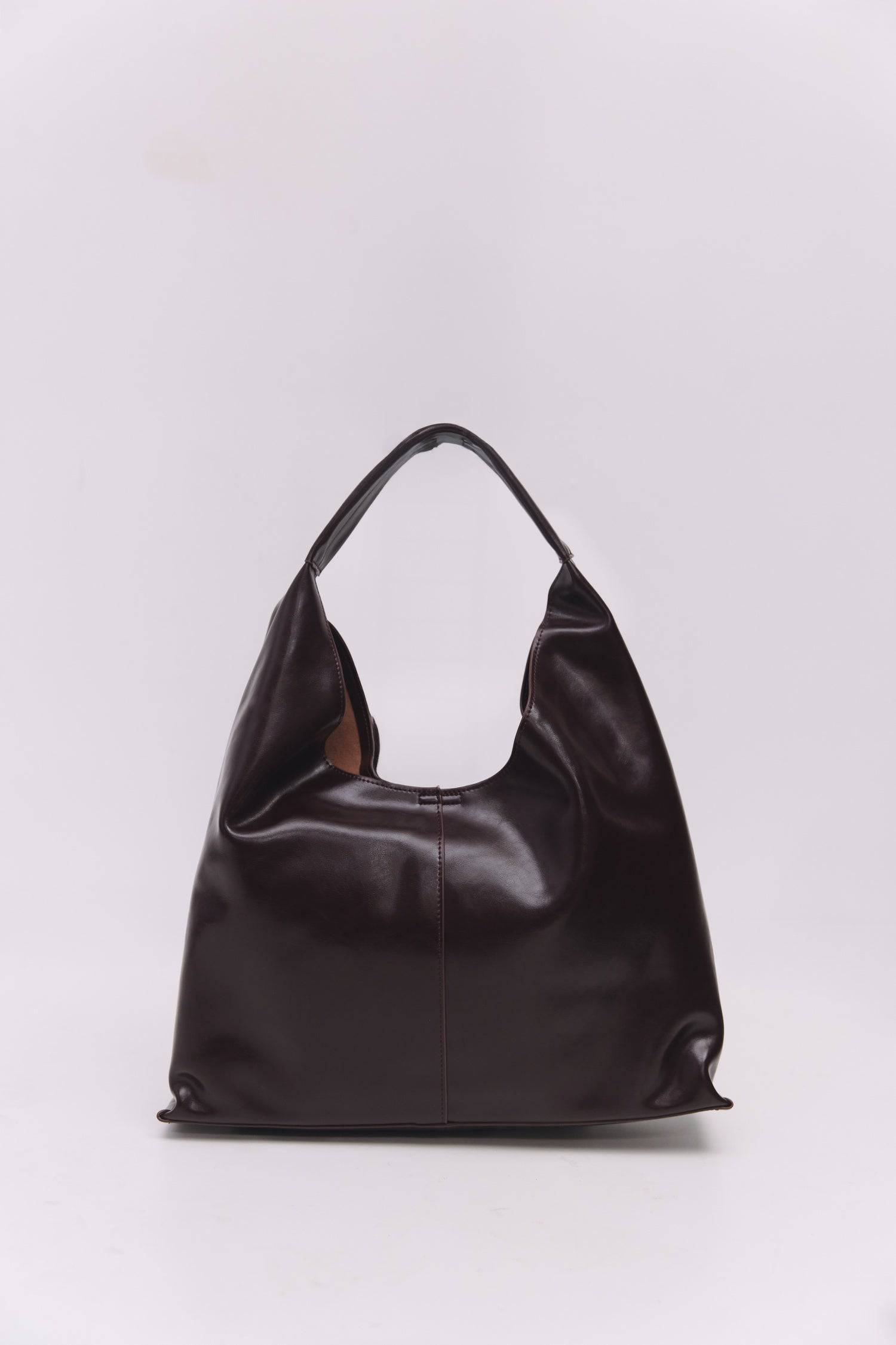 8989083599069, The Cosani Bag, Bags, Mod Ref | Common Market, accessories,bag,bags,cf-color-khaki,cf-color-white,cf-vendor-mod-ref-common-market,dark brown,modrefcommonmarket,Oversized,purse, Information The Cosani Bag is a medium-sized, slouchy patent leather bindle bag with a front seam detail and integrated patent strap. Features a magnetic button closure, flat bottom for structure, and a removable makeup or coin purse for added convenience. Details 100% Cowhide Slouchy Shape Magnetic Button Closure Remo