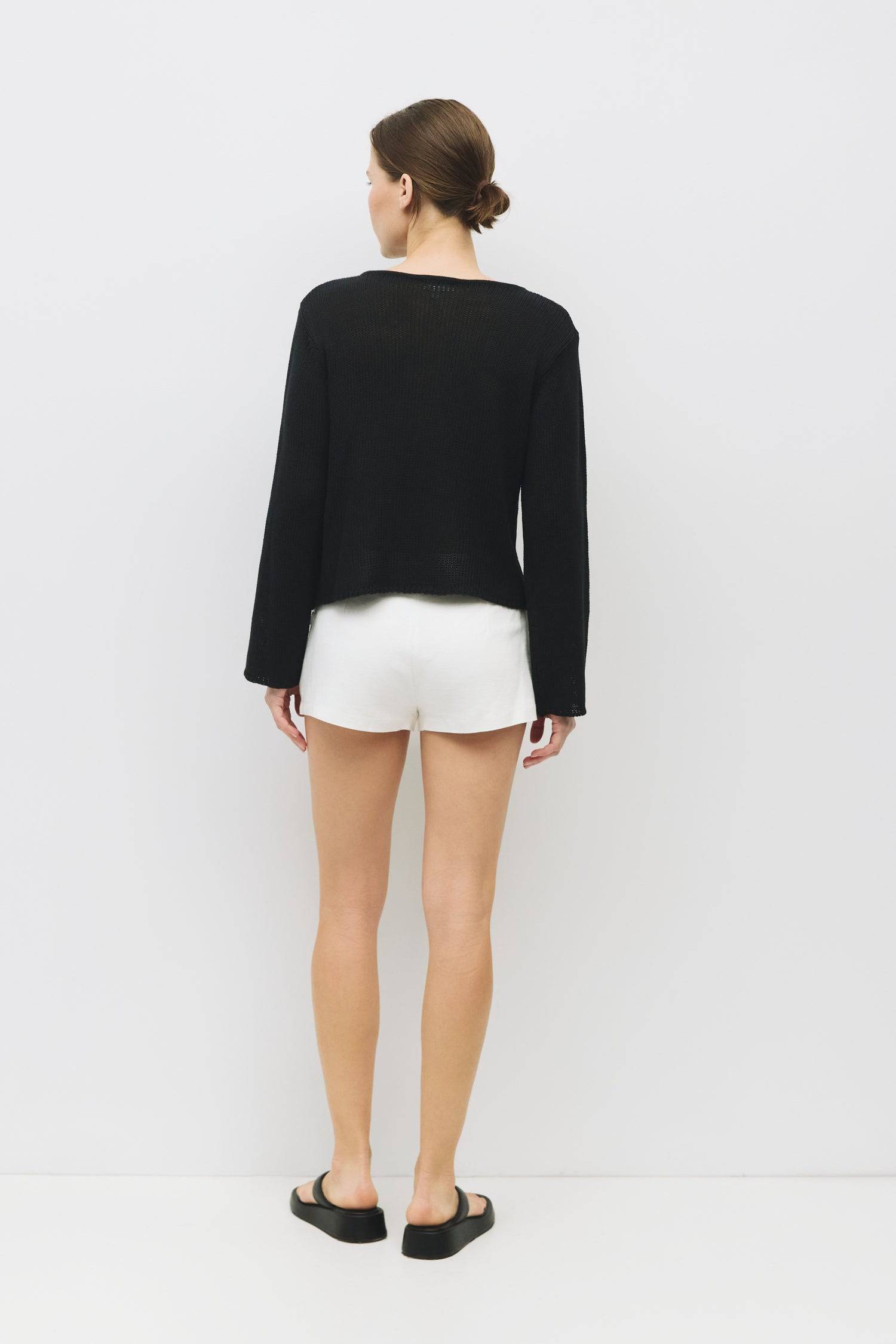 8929241989341, The Tala Sweater, Tops, All Row, All Row,allrow,Basic,Basics,Black,Blue,Cardigan,Casual,cf-color-black,cf-color-blue,cf-color-cream,cf-size-l,cf-size-m,cf-size-s,Comfortable,Cream,Crew Neck,Crop,Cropped,cropped hemline,Everyday,Grey,key hole,Light Blue,longsleeve,Matching Set,new,set,Sets,Shell Buttons,Short Sleeve,Spring,stretch,Transitional,Womens,womens top, Information The Tala Sweater is a comfy long-sleeve piece featuring a unique front cut-out with a button closure for added flair. Wit