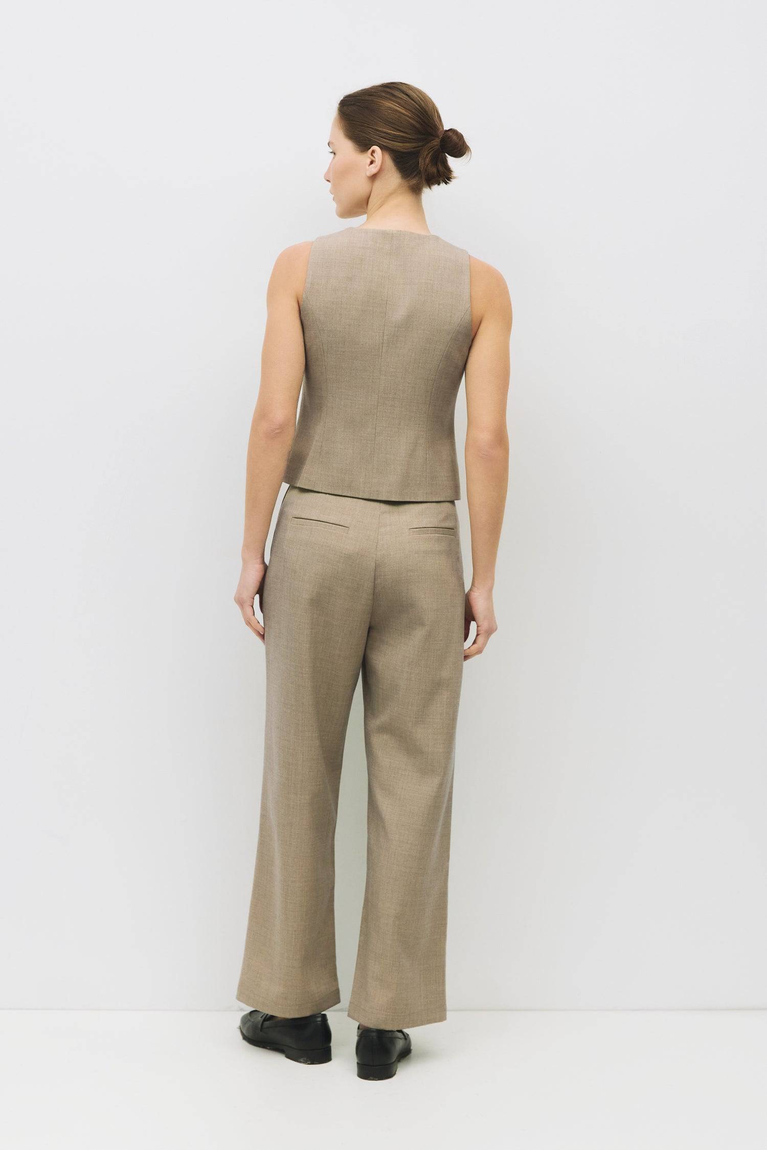 8983722033373, The Andrea Top, Tops, Mod Ref, Black,Bone,Casual,cf-color-bone,cf-size-l,cf-size-m,cf-size-s,cf-size-xl,cf-vendor-all-row,Comfortable,Crew Neckline,Everyday,ivory,Layers,Lightweight,Minimal,new,set,Sets,Sleeveless,Sleeveless Top,Soft,Spring,Top,Trendy,Vest,Vest Top,Women's, Information The Andrea Top is a refined take on the sleeveless vest. Designed with a round neckline, front button closure, and tailored princess seams for a fitted, polished silhouette. Details Self: 75% Polyester, 20% Ray