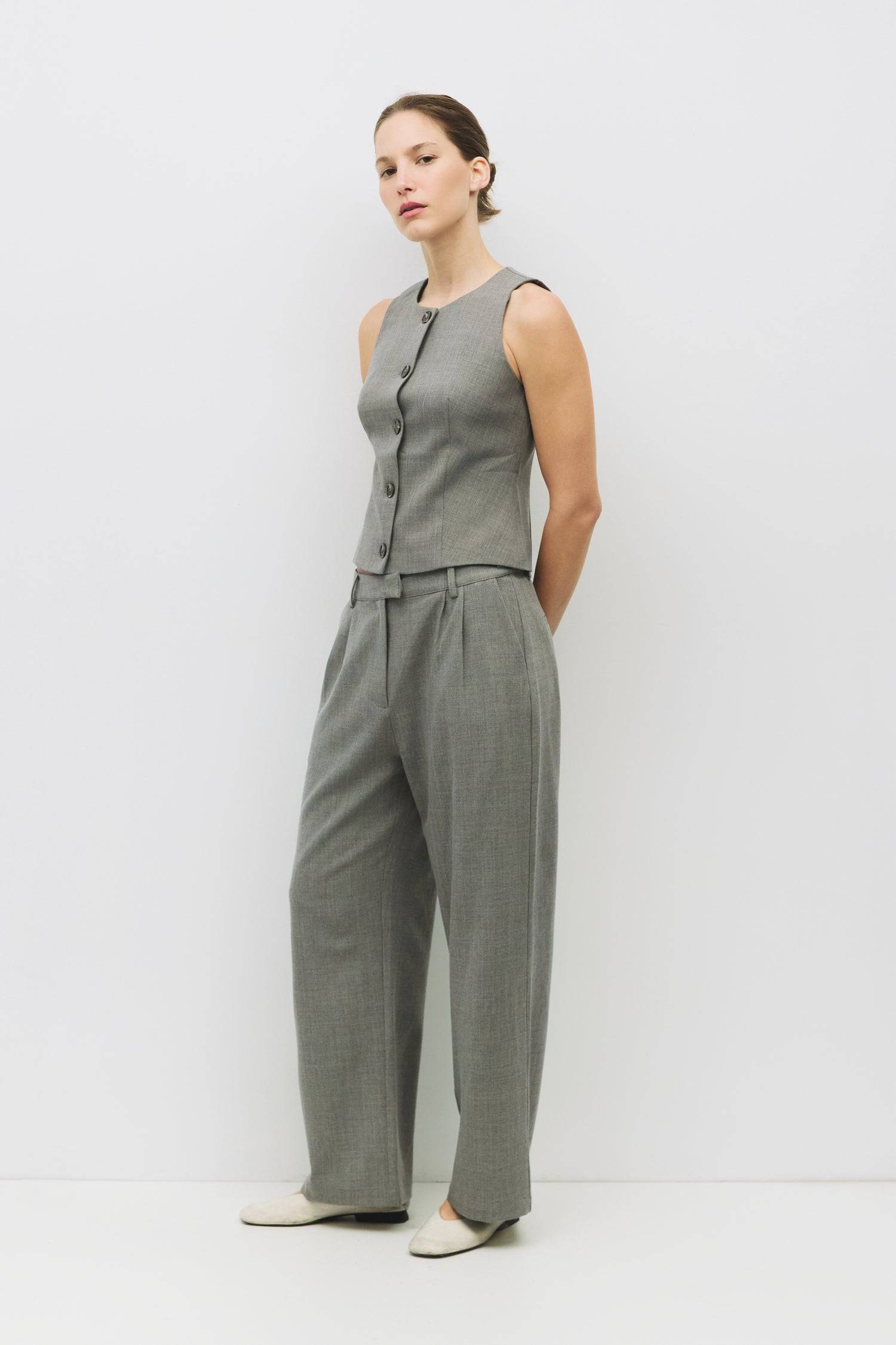 8983722033373, The Andrea Top, Tops, Mod Ref, Black,Bone,Casual,cf-color-bone,cf-size-l,cf-size-m,cf-size-s,cf-size-xl,cf-vendor-all-row,Comfortable,Crew Neckline,Everyday,ivory,Layers,Lightweight,Minimal,new,set,Sets,Sleeveless,Sleeveless Top,Soft,Spring,Top,Trendy,Vest,Vest Top,Women's, Information The Andrea Top is a refined take on the sleeveless vest. Designed with a round neckline, front button closure, and tailored princess seams for a fitted, polished silhouette. Details Self: 75% Polyester, 20% Ray