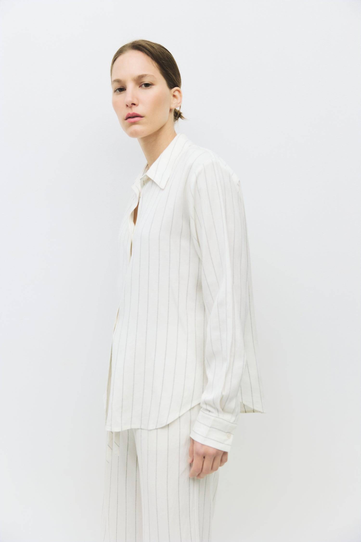 8983726784733, The Raquel Top, Tops, Mod Ref, Black,Breathable,Button down,Button Down Shirt,Button Up,Casual,cf-color-black,cf-color-blue,cf-color-white,cf-size-l,cf-size-m,cf-size-s,cf-vendor-mod-ref,cinched,Cinched Back,Cinched Waist,collared,Collared Top,Cotton,everyday,Long Sleeve,Long Sleeve Top,new,Oversized,spring,Striped,Summer,Tops,Transitional,white,womens,Work,Workwear, Information The Raquel Top is a button-down style made from a pinstripe linen blend, featuring a classic collar neckline and lo