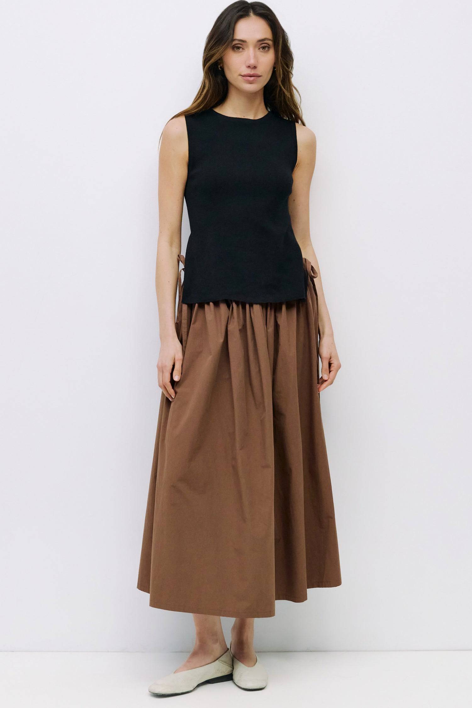 8983738777821, The Amina Top, Tops, Mod Ref, 90s,Basic,Basics,Black,Blue,Casual,cf-color-black,cf-color-blue,cf-color-white,cf-size-l,cf-size-m,cf-size-s,cf-vendor-mod-ref,Comfortable,Crew Neck,Crew Neckline,Everyday,Form Fitting,Ribbed,Ribbed Fabric,Ribbed Top,Short Sleeve,Spring,stretch,Stretchy,Summer,Tee,Tops,Transitional,white,Women's, Information The Amina Top is a sleek, sleeveless knit tank with a fitted silhouette and subtle side slits for ease of movement. Finished with a ribbed neckband and armho