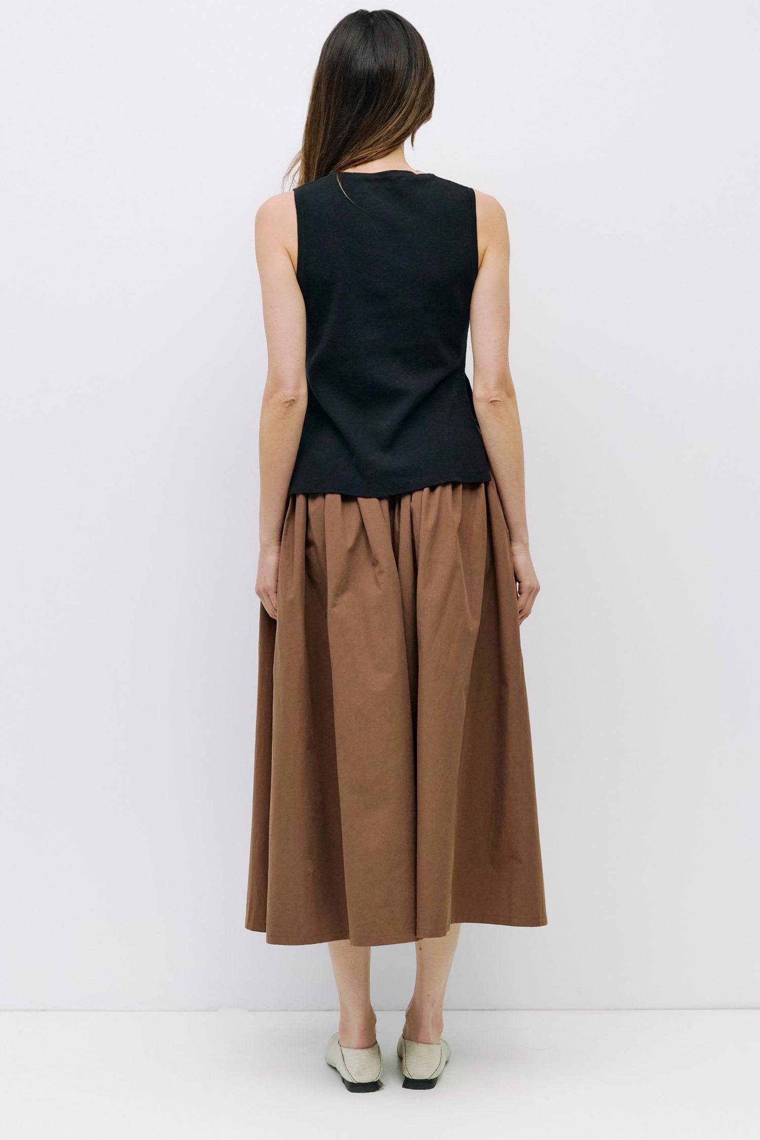 8983738777821, The Amina Top, Tops, Mod Ref, 90s,Basic,Basics,Black,Blue,Casual,cf-color-black,cf-color-blue,cf-color-white,cf-size-l,cf-size-m,cf-size-s,cf-vendor-mod-ref,Comfortable,Crew Neck,Crew Neckline,Everyday,Form Fitting,Ribbed,Ribbed Fabric,Ribbed Top,Short Sleeve,Spring,stretch,Stretchy,Summer,Tee,Tops,Transitional,white,Women's, Information The Amina Top is a sleek, sleeveless knit tank with a fitted silhouette and subtle side slits for ease of movement. Finished with a ribbed neckband and armho