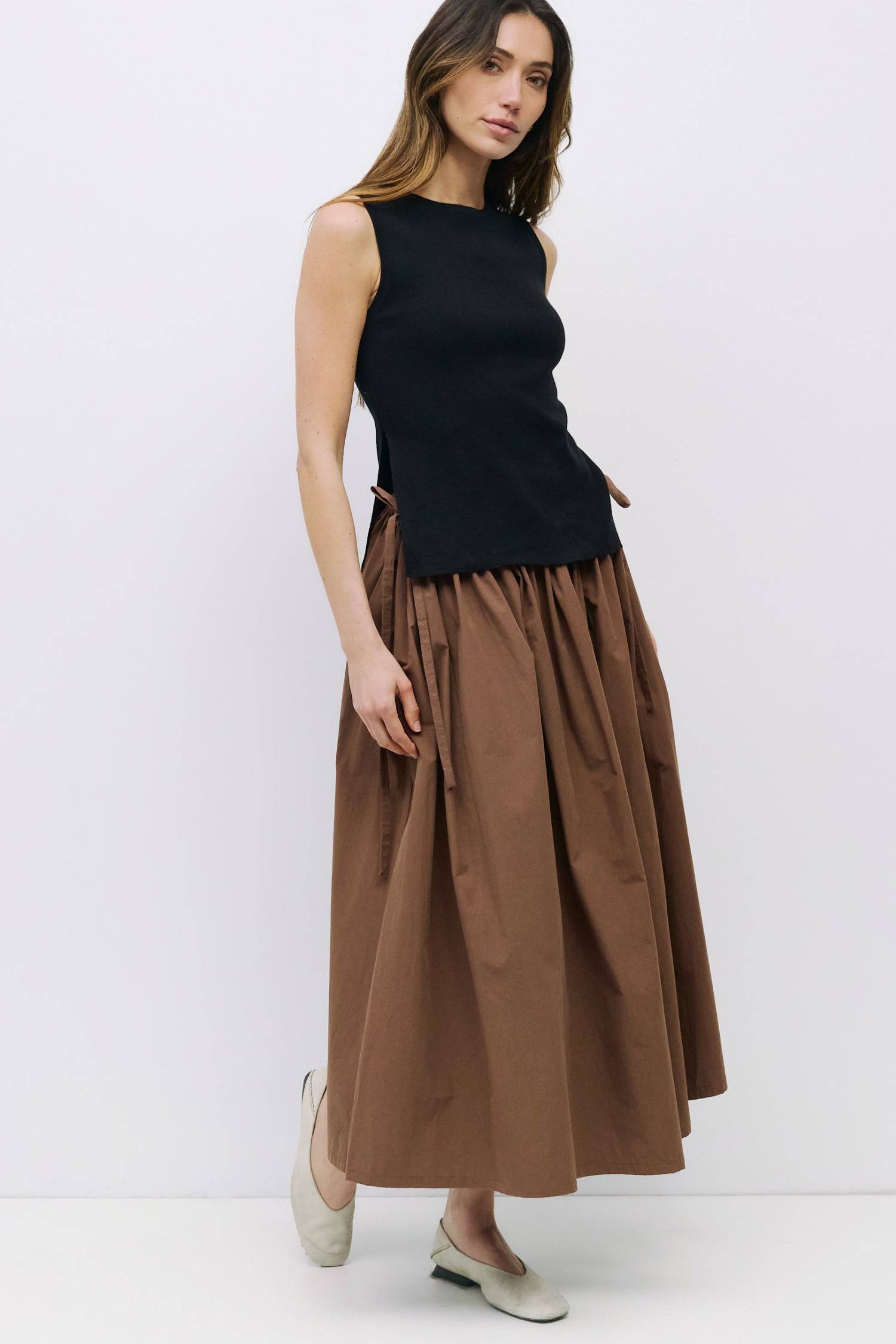 8983738777821, The Amina Top, Tops, Mod Ref, 90s,Basic,Basics,Black,Blue,Casual,cf-color-black,cf-color-blue,cf-color-white,cf-size-l,cf-size-m,cf-size-s,cf-vendor-mod-ref,Comfortable,Crew Neck,Crew Neckline,Everyday,Form Fitting,Ribbed,Ribbed Fabric,Ribbed Top,Short Sleeve,Spring,stretch,Stretchy,Summer,Tee,Tops,Transitional,white,Women's, Information The Amina Top is a sleek, sleeveless knit tank with a fitted silhouette and subtle side slits for ease of movement. Finished with a ribbed neckband and armho