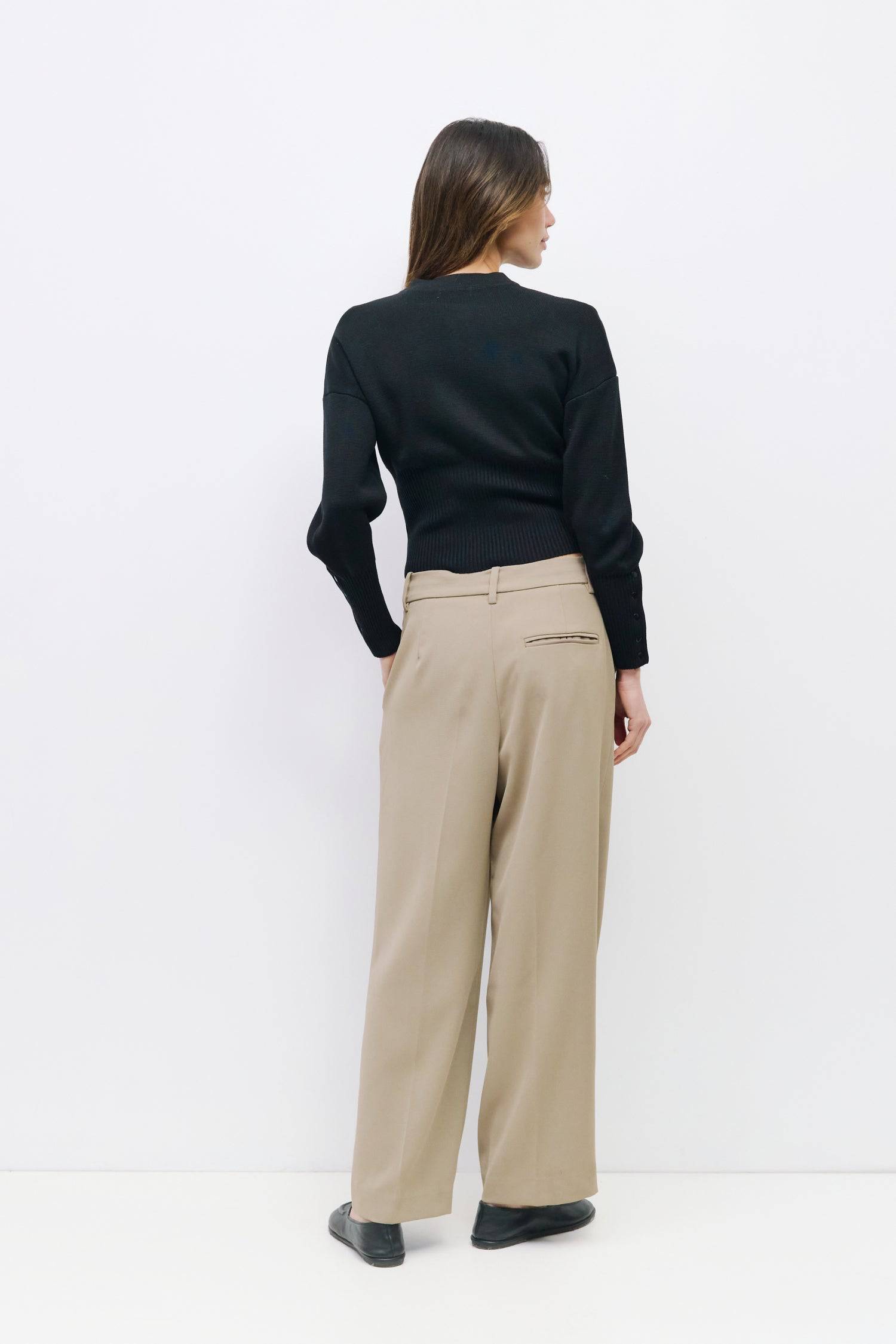 9045597520093, The Rosaline Top, Tops, Mod Ref, Bishop Sleeves,Button Front,cf-color-black,cf-size-m,cf-size-s,cf-size-xl,cf-size-xs,cf-vendor-mod-ref,cinched,Cinched Waist,Comfortable,Everyday,Front Clasp,heavy weight,Knit,Long Sleeve,Mod Ref,modref,new,Rib Knit,ribbd waist,Ribbed,snap closure,Top,Tops,Transitional,Women's,womens top, Information The Rosaline Top is a high-waist sweater top crafted from a heavy knit with a structured silhouette. Designed with a crewneck, bishop sleeves, and ribbing at the