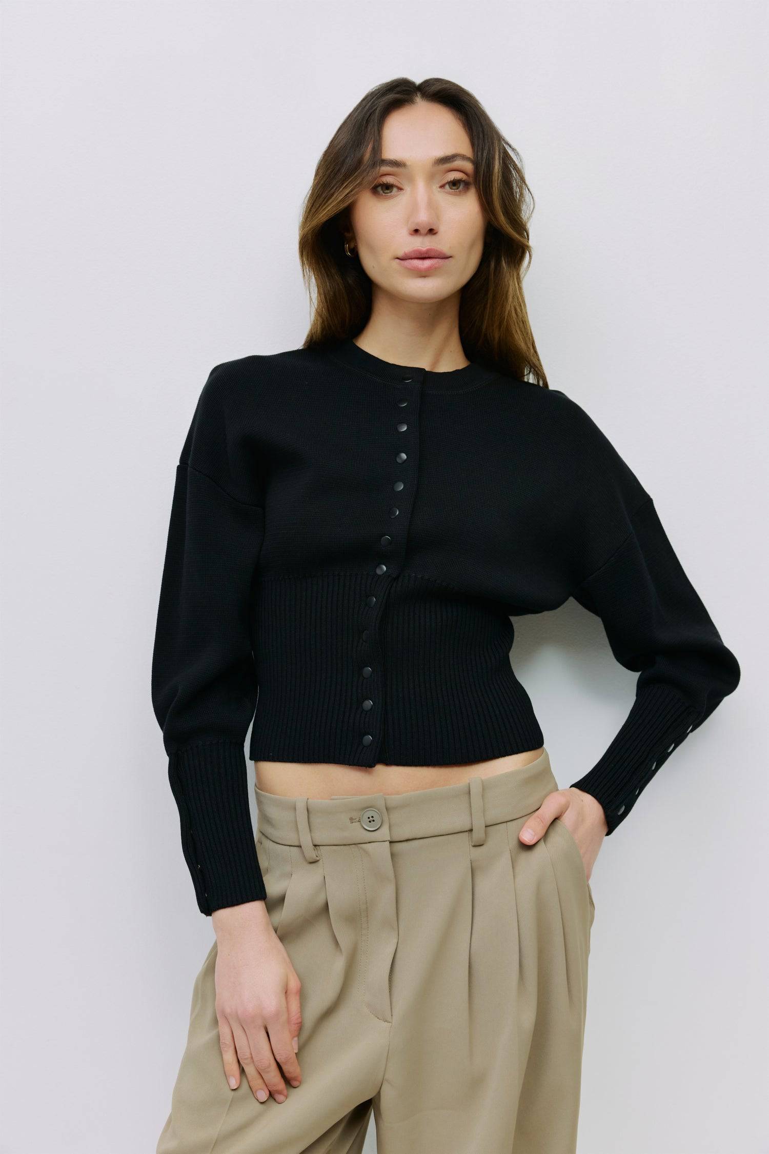 9045597520093, The Rosaline Top, Tops, Mod Ref, Bishop Sleeves,Button Front,cf-color-black,cf-size-m,cf-size-s,cf-size-xl,cf-size-xs,cf-vendor-mod-ref,cinched,Cinched Waist,Comfortable,Everyday,Front Clasp,heavy weight,Knit,Long Sleeve,Mod Ref,modref,new,Rib Knit,ribbd waist,Ribbed,snap closure,Top,Tops,Transitional,Women's,womens top, Information The Rosaline Top is a high-waist sweater top crafted from a heavy knit with a structured silhouette. Designed with a crewneck, bishop sleeves, and ribbing at the