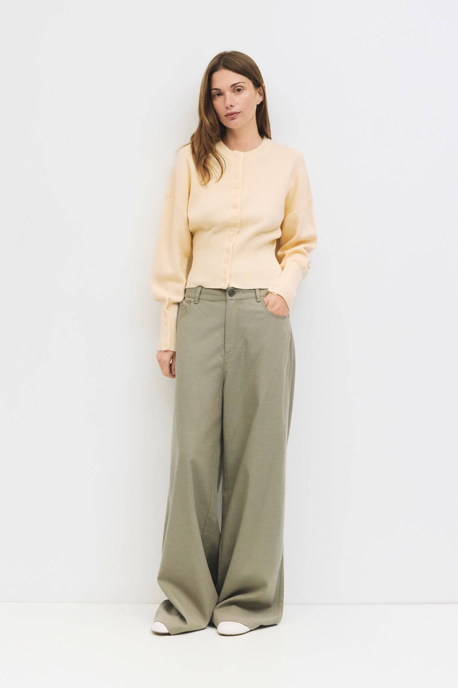 9045597520093, The Rosaline Top, Tops, Mod Ref, Bishop Sleeves,Button Front,cf-color-black,cf-size-m,cf-size-s,cf-size-xl,cf-size-xs,cf-vendor-mod-ref,cinched,Cinched Waist,Comfortable,Everyday,Front Clasp,heavy weight,Knit,Long Sleeve,Mod Ref,modref,new,Rib Knit,ribbd waist,Ribbed,snap closure,Top,Tops,Transitional,Women's,womens top, Information The Rosaline Top is a high-waist sweater top crafted from a heavy knit with a structured silhouette. Designed with a crewneck, bishop sleeves, and ribbing at the