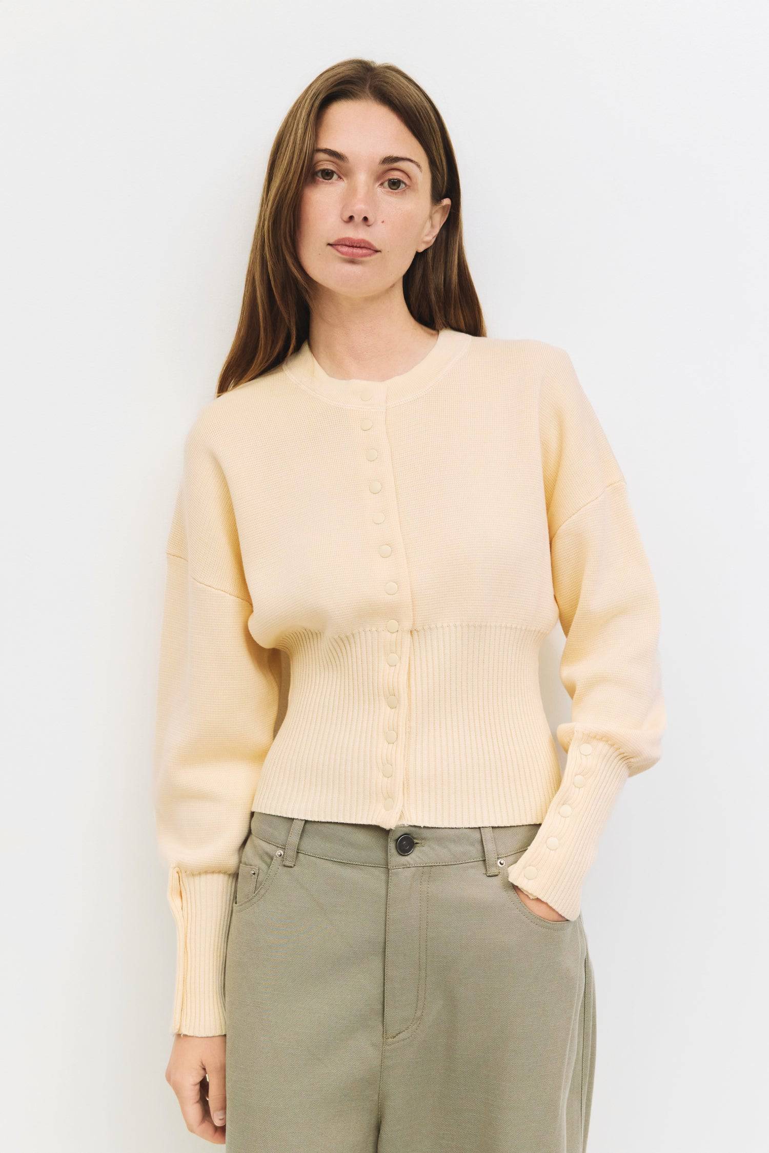 9045597520093, The Rosaline Top, Tops, Mod Ref, Bishop Sleeves,Button Front,cf-color-black,cf-size-m,cf-size-s,cf-size-xl,cf-size-xs,cf-vendor-mod-ref,cinched,Cinched Waist,Comfortable,Everyday,Front Clasp,heavy weight,Knit,Long Sleeve,Mod Ref,modref,new,Rib Knit,ribbd waist,Ribbed,snap closure,Top,Tops,Transitional,Women's,womens top, Information The Rosaline Top is a high-waist sweater top crafted from a heavy knit with a structured silhouette. Designed with a crewneck, bishop sleeves, and ribbing at the