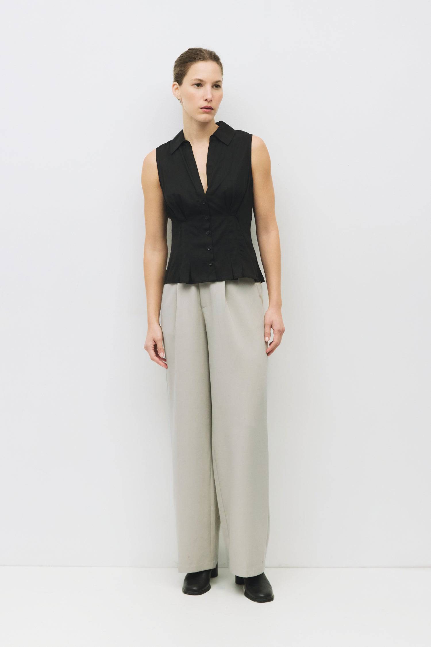 8983728750813, The Olsen Top, Tops, Mod Ref, Black,Breathable,Button down,Button Down Shirt,Button Up,Casual,cf-color-black,cf-color-blue,cf-color-white,cf-size-l,cf-size-m,cf-size-s,cf-vendor-mod-ref,cinched,Cinched Back,Cinched Waist,collared,Collared Top,Cotton,everyday,final-sale,finalsale,Long Sleeve,Long Sleeve Top,new,Oversized,sale,spring,Striped,Summer,Tops,Transitional,white,womens,Work,Workwear, Information The Olsen Top is a sleeveless button-down with a V neckline and front placket closure. Fea