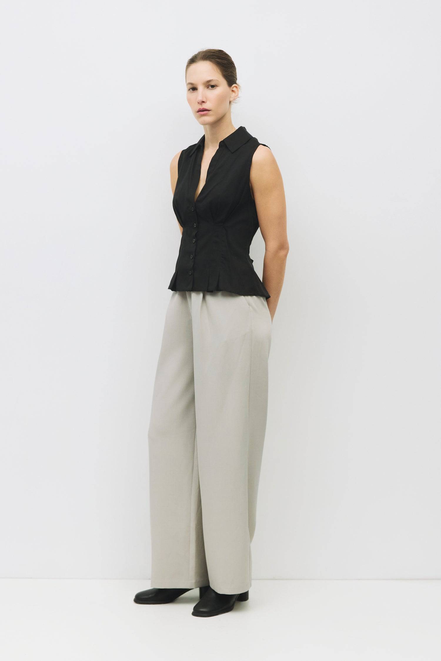 8983728750813, The Olsen Top, Tops, Mod Ref, Black,Breathable,Button down,Button Down Shirt,Button Up,Casual,cf-color-black,cf-color-blue,cf-color-white,cf-size-l,cf-size-m,cf-size-s,cf-vendor-mod-ref,cinched,Cinched Back,Cinched Waist,collared,Collared Top,Cotton,everyday,final-sale,finalsale,Long Sleeve,Long Sleeve Top,new,Oversized,sale,spring,Striped,Summer,Tops,Transitional,white,womens,Work,Workwear, Information The Olsen Top is a sleeveless button-down with a V neckline and front placket closure. Fea