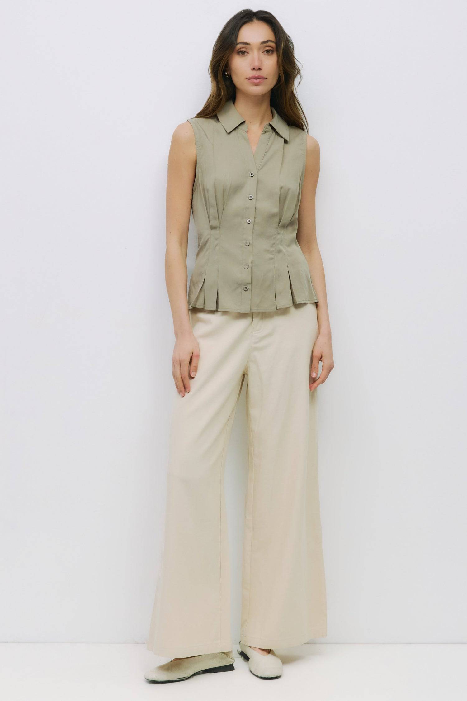 8983728750813, The Olsen Top, Tops, Mod Ref, Black,Breathable,Button down,Button Down Shirt,Button Up,Casual,cf-color-black,cf-color-blue,cf-color-white,cf-size-l,cf-size-m,cf-size-s,cf-vendor-mod-ref,cinched,Cinched Back,Cinched Waist,collared,Collared Top,Cotton,everyday,final-sale,finalsale,Long Sleeve,Long Sleeve Top,new,Oversized,sale,spring,Striped,Summer,Tops,Transitional,white,womens,Work,Workwear, Information The Olsen Top is a sleeveless button-down with a V neckline and front placket closure. Fea