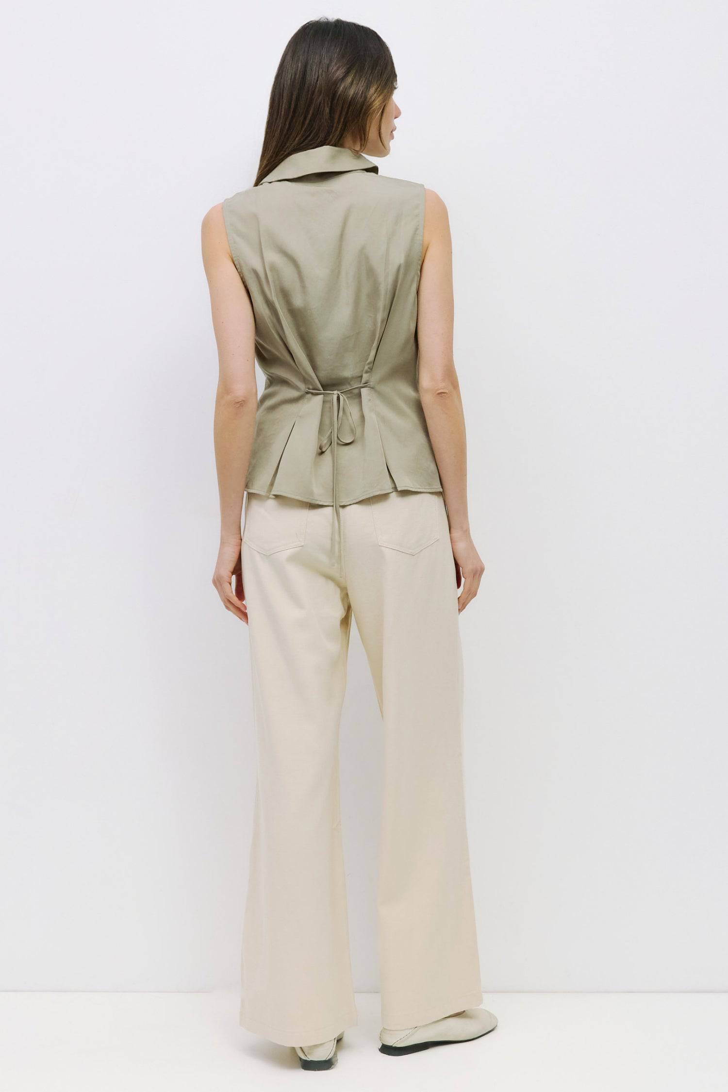 8983728750813, The Olsen Top, Tops, Mod Ref, Black,Breathable,Button down,Button Down Shirt,Button Up,Casual,cf-color-black,cf-color-blue,cf-color-white,cf-size-l,cf-size-m,cf-size-s,cf-vendor-mod-ref,cinched,Cinched Back,Cinched Waist,collared,Collared Top,Cotton,everyday,final-sale,finalsale,Long Sleeve,Long Sleeve Top,new,Oversized,sale,spring,Striped,Summer,Tops,Transitional,white,womens,Work,Workwear, Information The Olsen Top is a sleeveless button-down with a V neckline and front placket closure. Fea