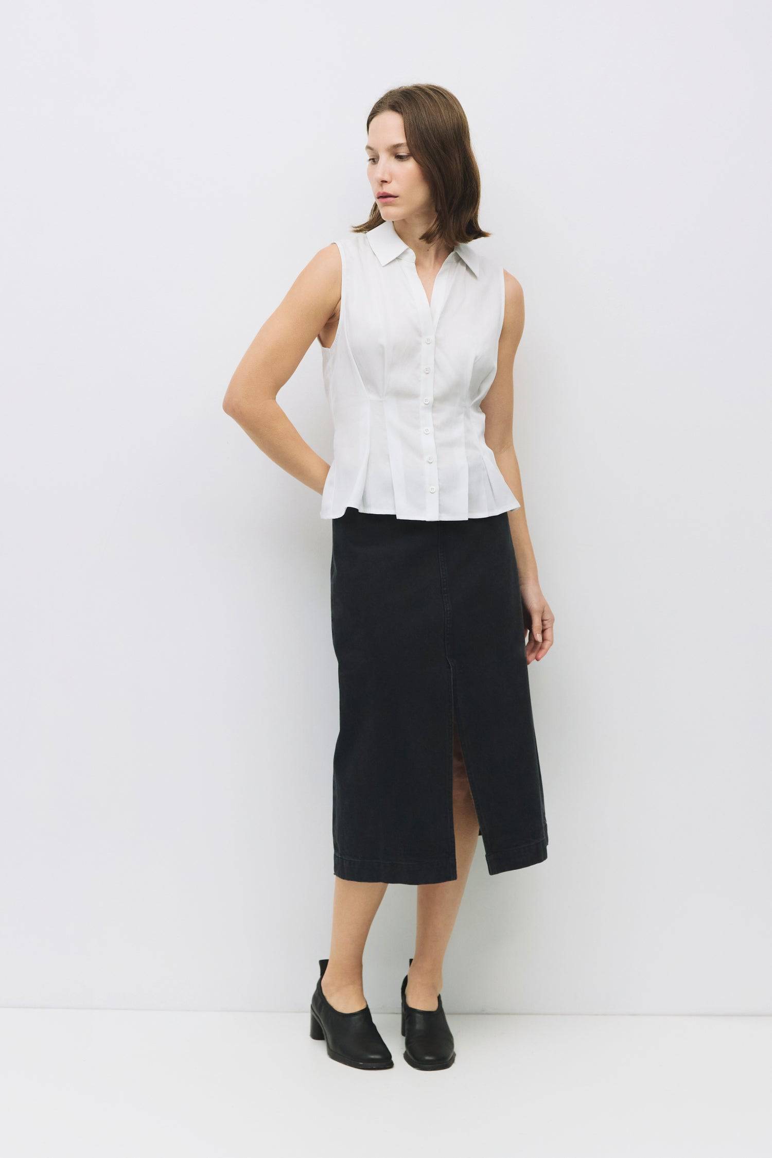 8983728750813, The Olsen Top, Tops, Mod Ref, Black,Breathable,Button down,Button Down Shirt,Button Up,Casual,cf-color-black,cf-color-blue,cf-color-white,cf-size-l,cf-size-m,cf-size-s,cf-vendor-mod-ref,cinched,Cinched Back,Cinched Waist,collared,Collared Top,Cotton,everyday,final-sale,finalsale,Long Sleeve,Long Sleeve Top,new,Oversized,sale,spring,Striped,Summer,Tops,Transitional,white,womens,Work,Workwear, Information The Olsen Top is a sleeveless button-down with a V neckline and front placket closure. Fea