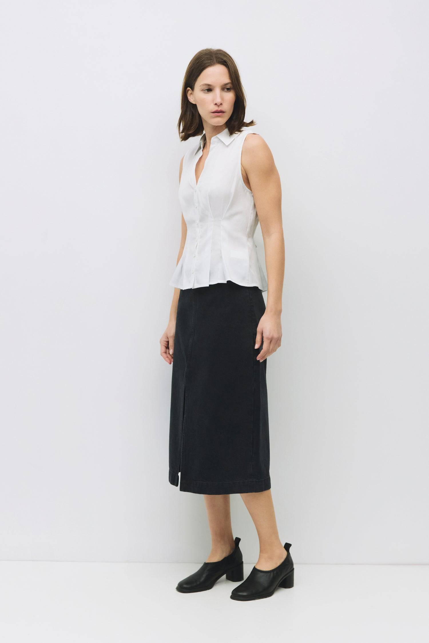 8983728750813, The Olsen Top, Tops, Mod Ref, Black,Breathable,Button down,Button Down Shirt,Button Up,Casual,cf-color-black,cf-color-blue,cf-color-white,cf-size-l,cf-size-m,cf-size-s,cf-vendor-mod-ref,cinched,Cinched Back,Cinched Waist,collared,Collared Top,Cotton,everyday,final-sale,finalsale,Long Sleeve,Long Sleeve Top,new,Oversized,sale,spring,Striped,Summer,Tops,Transitional,white,womens,Work,Workwear, Information The Olsen Top is a sleeveless button-down with a V neckline and front placket closure. Fea