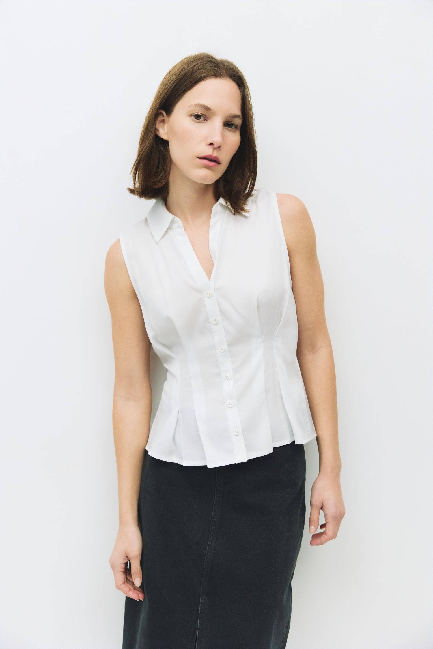 8983728750813, The Olsen Top, Tops, Mod Ref, Black,Breathable,Button down,Button Down Shirt,Button Up,Casual,cf-color-black,cf-color-blue,cf-color-white,cf-size-l,cf-size-m,cf-size-s,cf-vendor-mod-ref,cinched,Cinched Back,Cinched Waist,collared,Collared Top,Cotton,everyday,final-sale,finalsale,Long Sleeve,Long Sleeve Top,new,Oversized,sale,spring,Striped,Summer,Tops,Transitional,white,womens,Work,Workwear, Information The Olsen Top is a sleeveless button-down with a V neckline and front placket closure. Fea