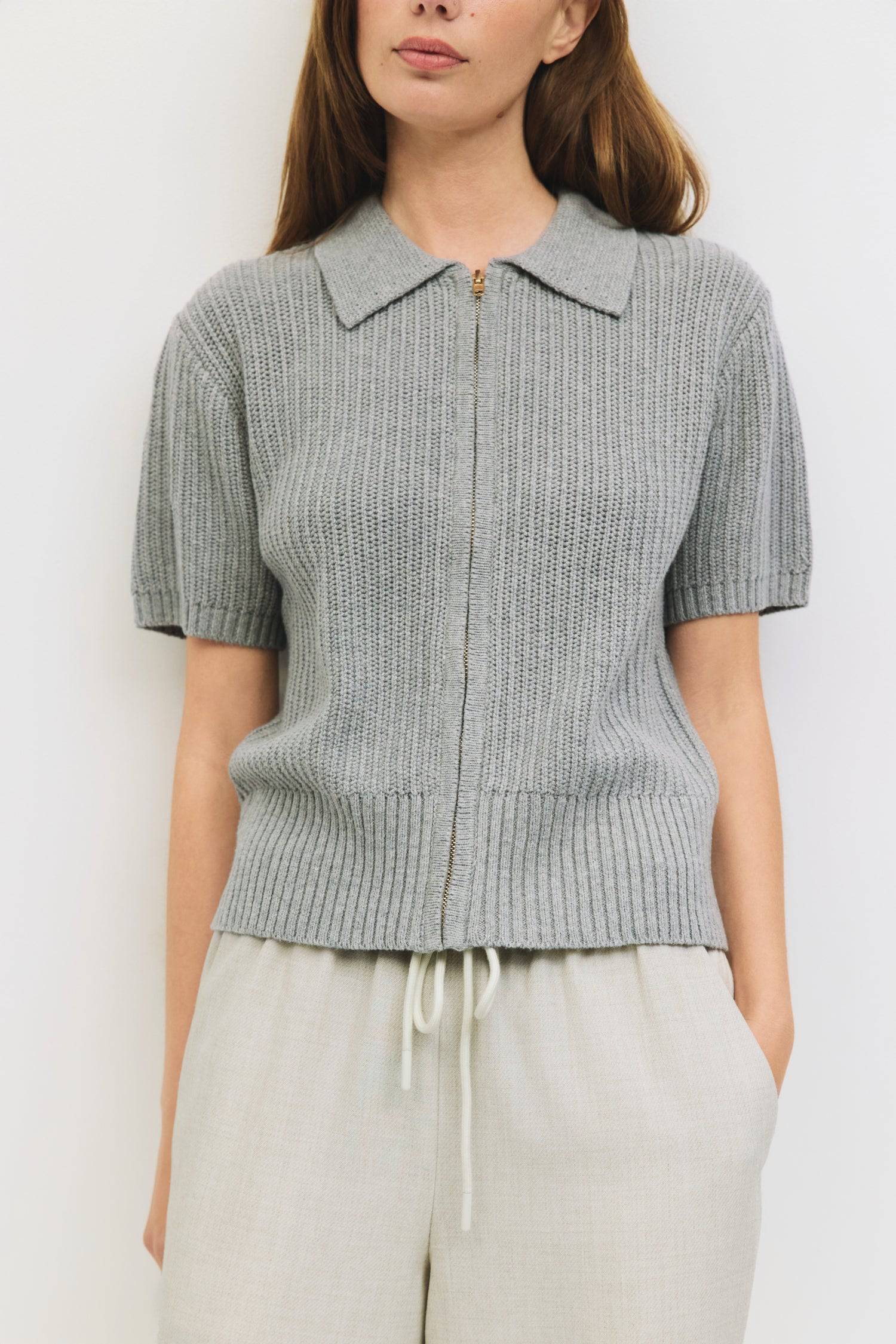 9045652603101, The Nadia Top, Tops, Mod Ref, Casual,cf-color-grey,cf-color-khaki,cf-size-l,cf-size-m,cf-size-s,cf-size-xl,cf-size-xs,cf-vendor-mod-ref,cinched,Cinched Waist,collared,Collared Top,Comfortable,Cotton,Everyday,Grey,Khaki,Knit,mid weight,Mod Ref,modref,new,Relaxed,Relaxed Fit,Rib Knit,Short Sleeve,Soft Knit,Top,Tops,Transitional,Women's,womens top,Zip Up, Information The Nadia Top is a short-sleeve knit top crafted from a midweight open knit for a breathable feel, collared neckline, and a front