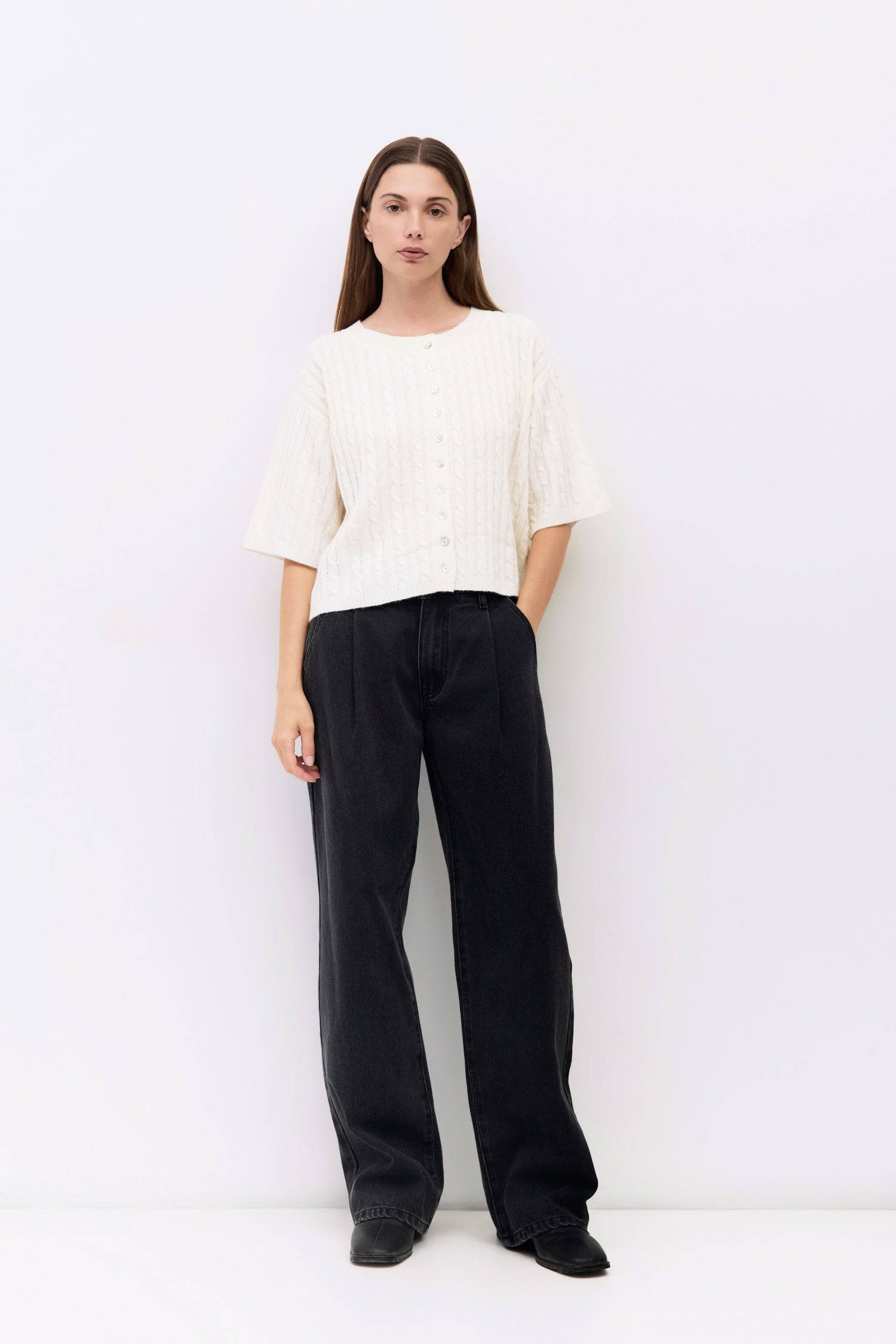 9045724397789, The Poppy Cardigan, Tops, Mod Ref, All Row,allrow,Basic,Basics,Blue,brown,Cable Knit,Cardigan,Casual,cf-color-brown,cf-color-cream,cf-color-grey,cf-color-red,cf-size-l,cf-size-m,cf-size-s,Comfortable,Cream,Crew Neck,Crop,Cropped,cropped hemline,Elbow Sleeves,Everyday,Grey,Heather Grey,mid weight,new,Red,Shell Buttons,Short Sleeve,Spring,stretch,Transitional,Womens,womens top,Wool,wool blend, Information The Poppy Cardigan is a relaxed-fit piece crafted from midweight cable knit, featuring elb