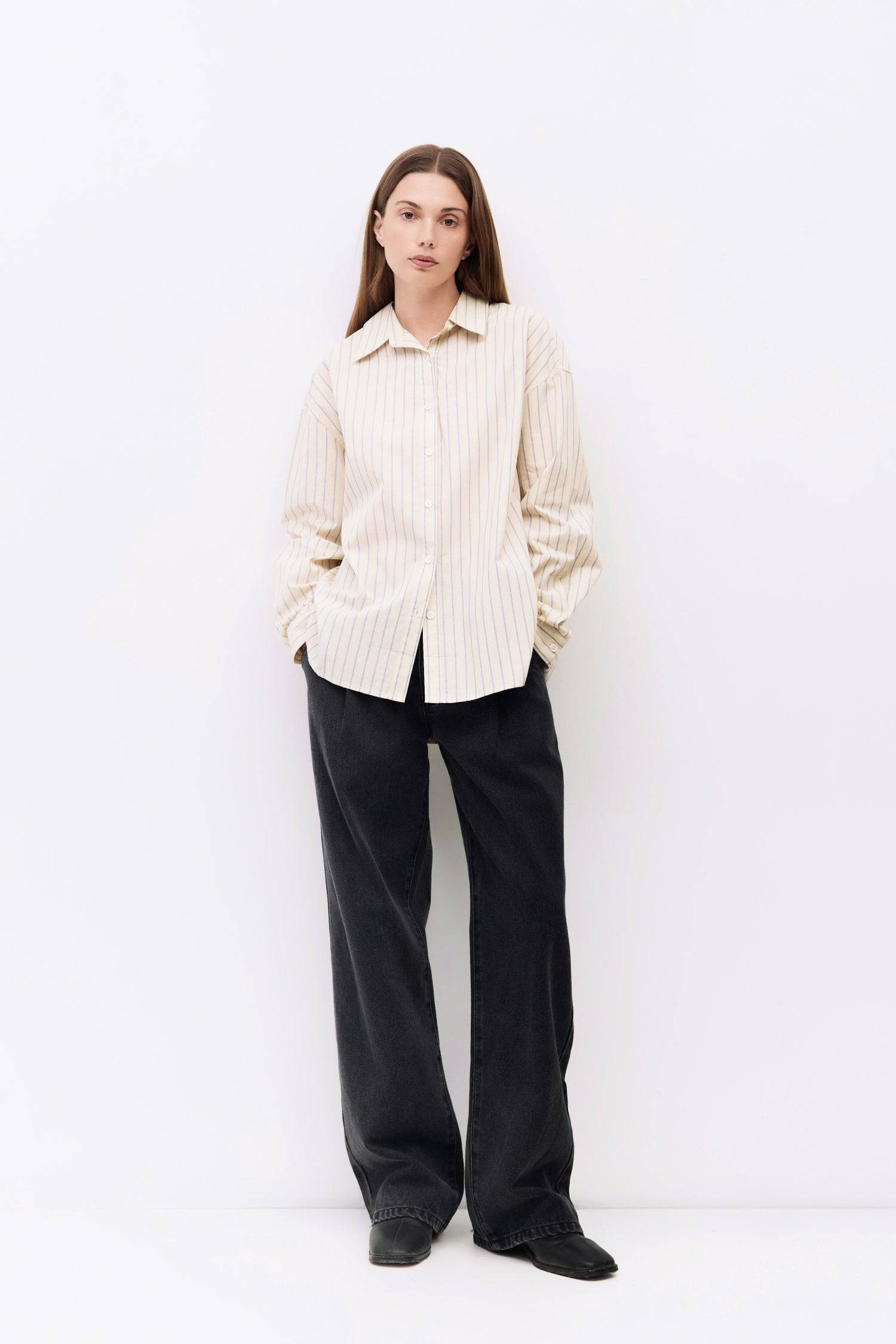 9084487467229, The Brigid Top, Tops, All Row, Breathable,Button down,Button Down Shirt,Button Up,Casual,cf-color-blue,cf-color-white,cf-color-yellow,cf-size-l,cf-size-m,cf-size-s,collared,Collared Top,Cotton,everyday,Long Sleeve,Long Sleeve Top,new,off white,Oversized,Relaxed,Relaxed Fit,spring,Striped,Summer,Tops,Transitional,white,womens,Work,Workwear,Yellow, Information The Brigid Top is a relaxed-fit button-down made from lightweight 100% cotton striped fabric. It features a collared neckline, long slee