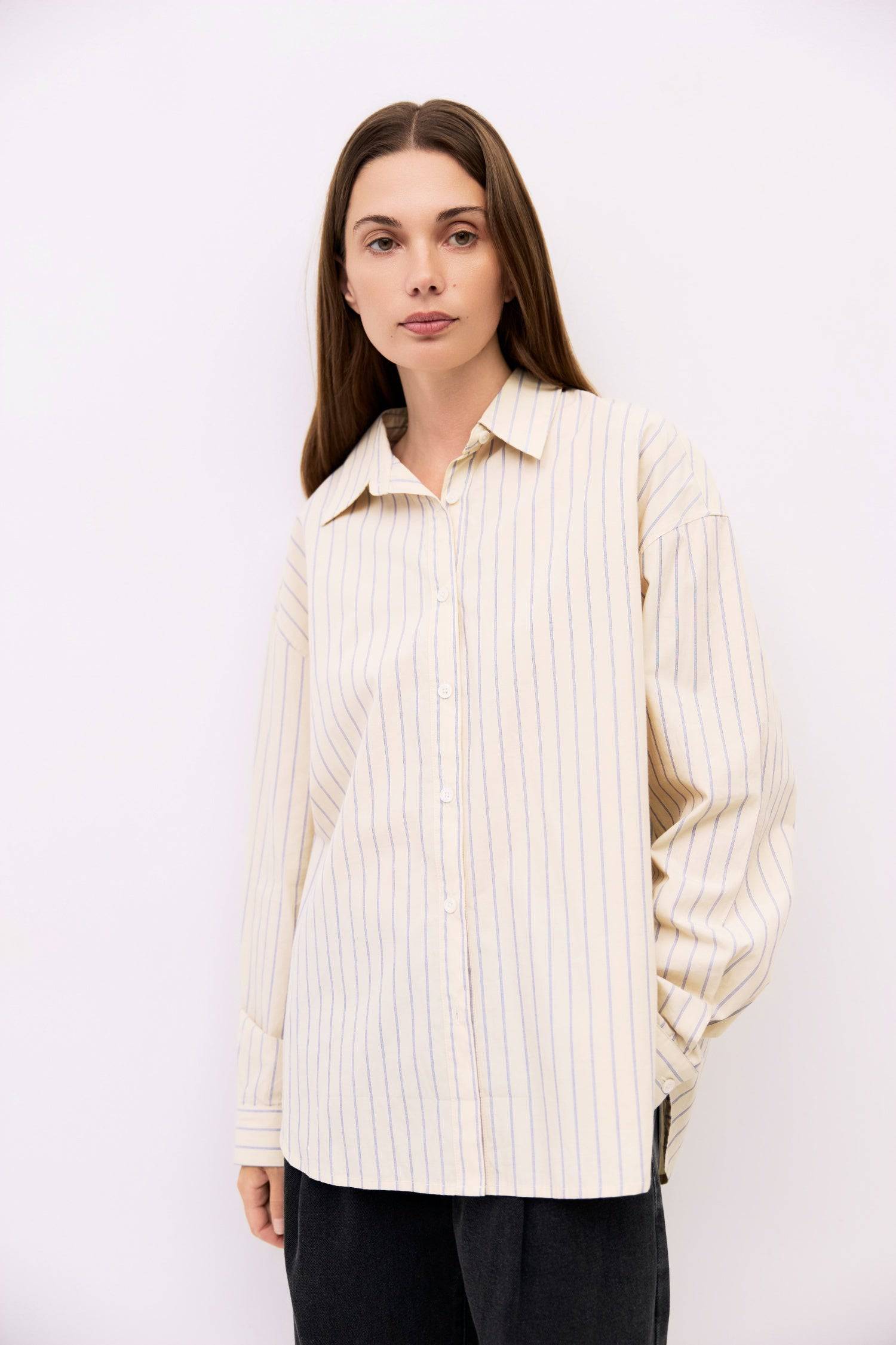 9084487467229, The Brigid Top, Tops, All Row, Breathable,Button down,Button Down Shirt,Button Up,Casual,cf-color-blue,cf-color-white,cf-color-yellow,cf-size-l,cf-size-m,cf-size-s,collared,Collared Top,Cotton,everyday,Long Sleeve,Long Sleeve Top,new,off white,Oversized,Relaxed,Relaxed Fit,spring,Striped,Summer,Tops,Transitional,white,womens,Work,Workwear,Yellow, Information The Brigid Top is a relaxed-fit button-down made from lightweight 100% cotton striped fabric. It features a collared neckline, long slee