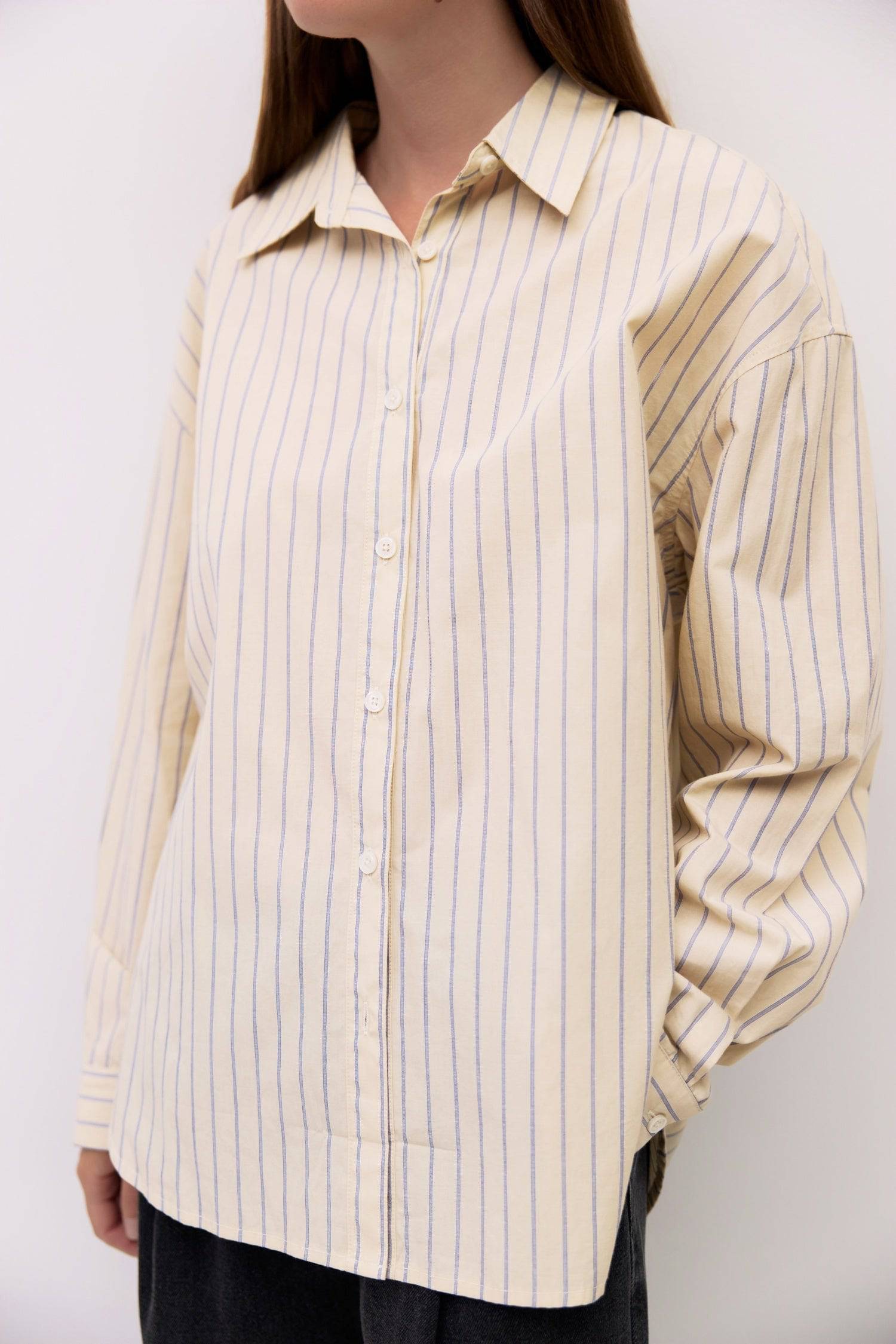 9084487467229, The Brigid Top, Tops, All Row, Breathable,Button down,Button Down Shirt,Button Up,Casual,cf-color-blue,cf-color-white,cf-color-yellow,cf-size-l,cf-size-m,cf-size-s,collared,Collared Top,Cotton,everyday,Long Sleeve,Long Sleeve Top,new,off white,Oversized,Relaxed,Relaxed Fit,spring,Striped,Summer,Tops,Transitional,white,womens,Work,Workwear,Yellow, Information The Brigid Top is a relaxed-fit button-down made from lightweight 100% cotton striped fabric. It features a collared neckline, long slee