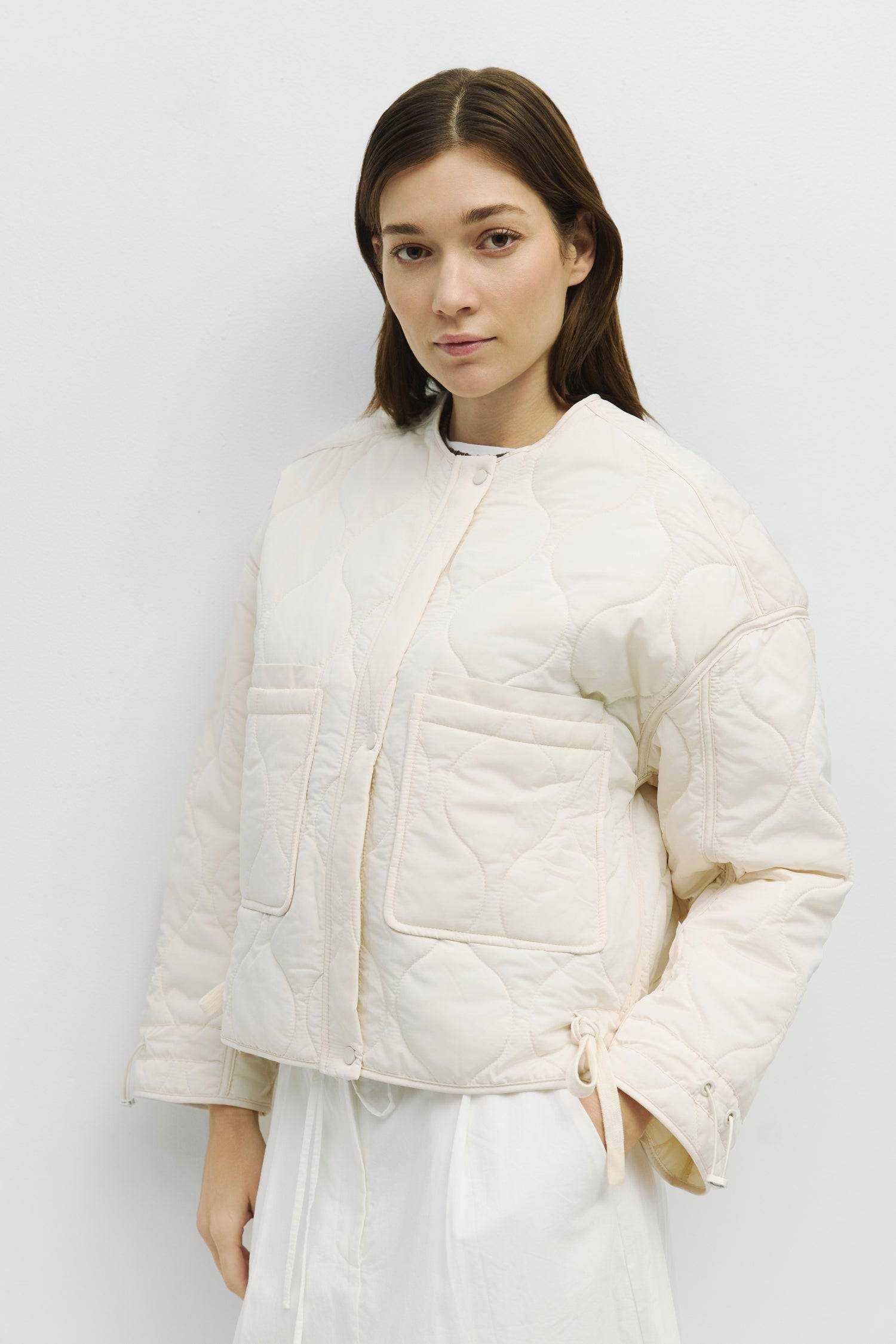 7352566743261, The Kara Jacket, Outerwear, Mod Ref, Adjustable Cords,autumn,Black,Buttons,Casual,cf-color-black,cf-color-olive,cf-color-tan,cf-size-l,cf-size-m,cf-vendor-mod-ref,Comfortable,Fall,Front Pockets,Jacket,Layers,Long Sleeve,mid-autumn,modref,new,Olive,Outerwear,Pockets,Quilted,Quilted Jacket,Relaxed,tan,Warm,Winter,Women's,Zipper, Information Quilted jacket with zip closure and button placket. The jacket features front patch pockets and includes adjustable cords at the wrist and jacket hem. Detai