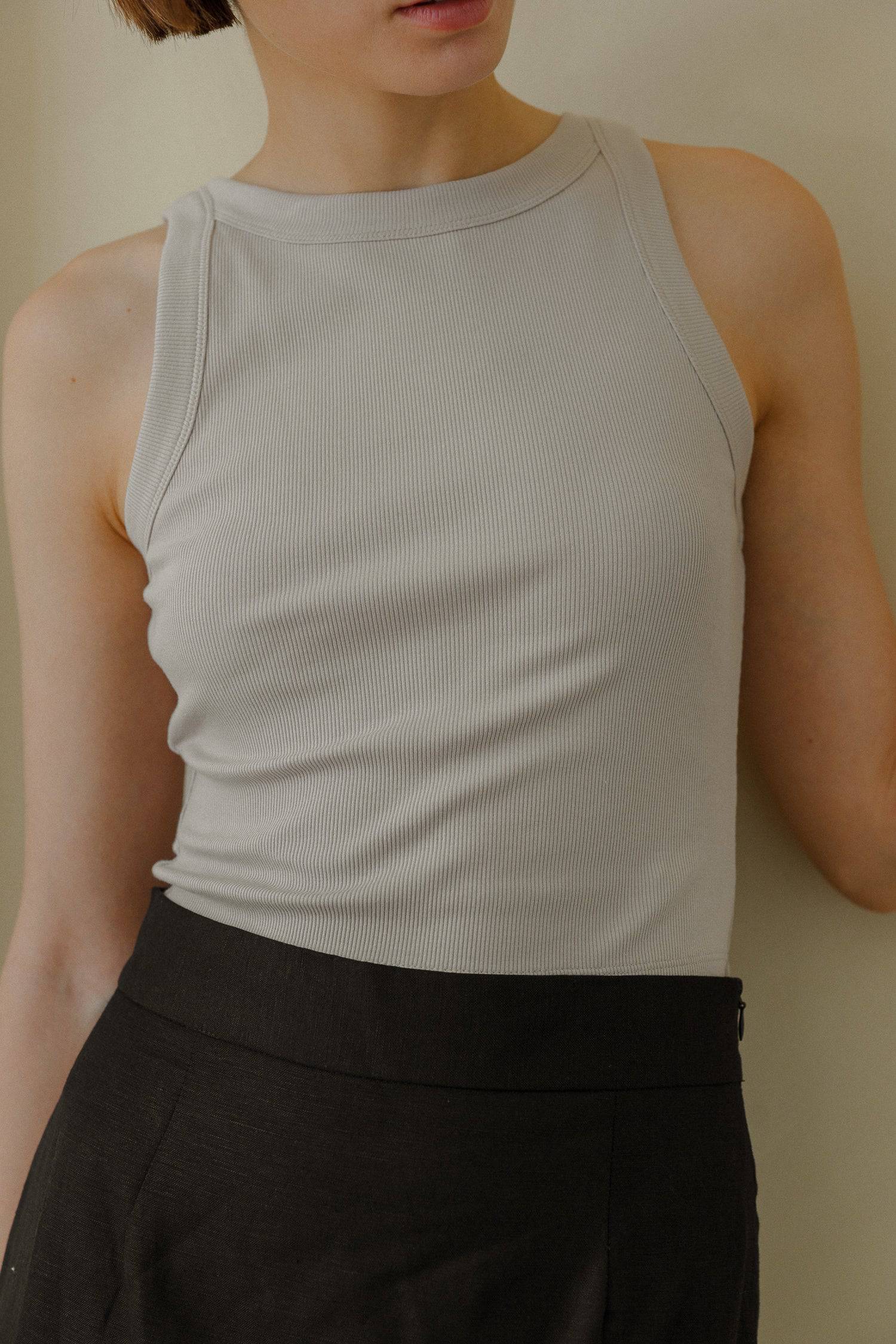 8169757147357, The Tonya Top, Tops, Mod Ref, Basic,Basics,Blush,cf-color-black,cf-color-blush,cf-color-olive,cf-size-l,cf-size-m,cf-size-s,cf-vendor-mod-ref,Cotton,Crop,Crop Top,Cropped,essentials,Everyday,final-sale,finalsale,layering,Layers,Olive,racerback,Rib,Ribbed,Ribbed Fabric,Ribbed Top,Ribbing,sale,tank,Tank Top, Information The Tonya Top is a basic cropped ribbed tank top. Crafted from a rayon-cotton-spandex blend, this racerback tank top is a versatile piece for your daily wardrobe. Perfect for pa