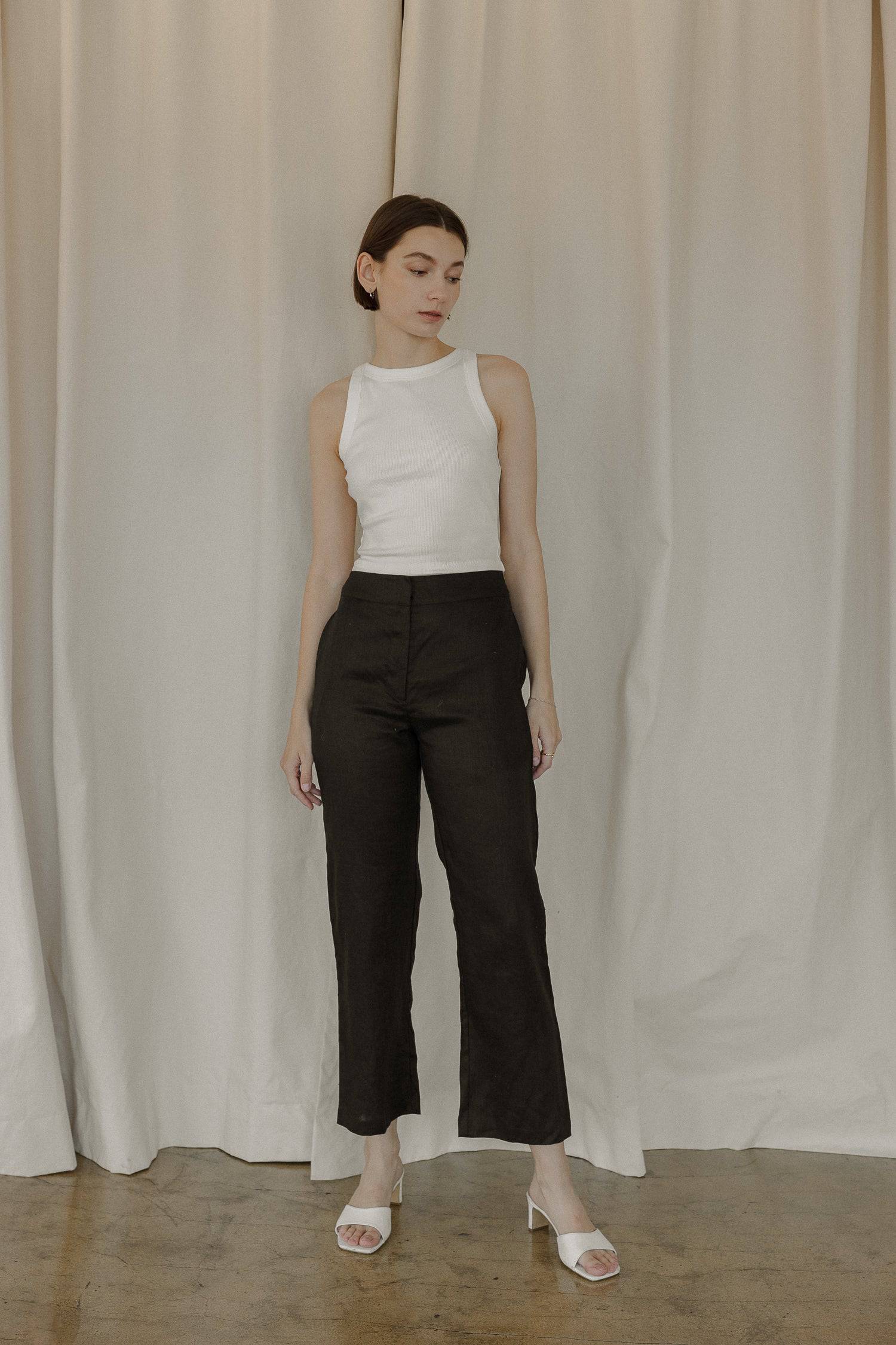 8169757147357, The Tonya Top, Tops, Mod Ref, Basic,Basics,Blush,cf-color-black,cf-color-blush,cf-color-olive,cf-size-l,cf-size-m,cf-size-s,cf-vendor-mod-ref,Cotton,Crop,Crop Top,Cropped,essentials,Everyday,final-sale,finalsale,layering,Layers,Olive,racerback,Rib,Ribbed,Ribbed Fabric,Ribbed Top,Ribbing,sale,tank,Tank Top, Information The Tonya Top is a basic cropped ribbed tank top. Crafted from a rayon-cotton-spandex blend, this racerback tank top is a versatile piece for your daily wardrobe. Perfect for pa