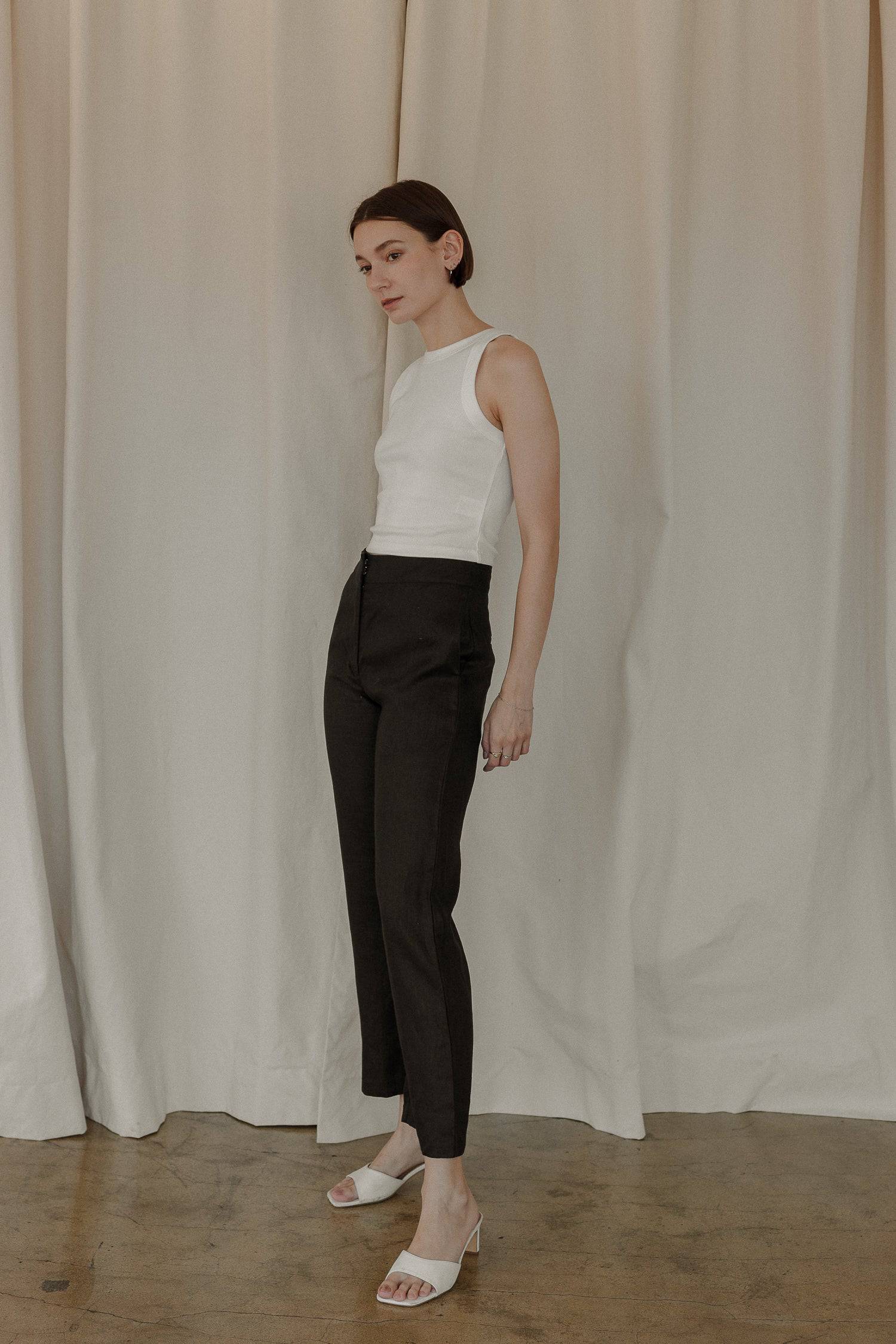 8169757147357, The Tonya Top, Tops, Mod Ref, Basic,Basics,Blush,cf-color-black,cf-color-blush,cf-color-olive,cf-size-l,cf-size-m,cf-size-s,cf-vendor-mod-ref,Cotton,Crop,Crop Top,Cropped,essentials,Everyday,final-sale,finalsale,layering,Layers,Olive,racerback,Rib,Ribbed,Ribbed Fabric,Ribbed Top,Ribbing,sale,tank,Tank Top, Information The Tonya Top is a basic cropped ribbed tank top. Crafted from a rayon-cotton-spandex blend, this racerback tank top is a versatile piece for your daily wardrobe. Perfect for pa