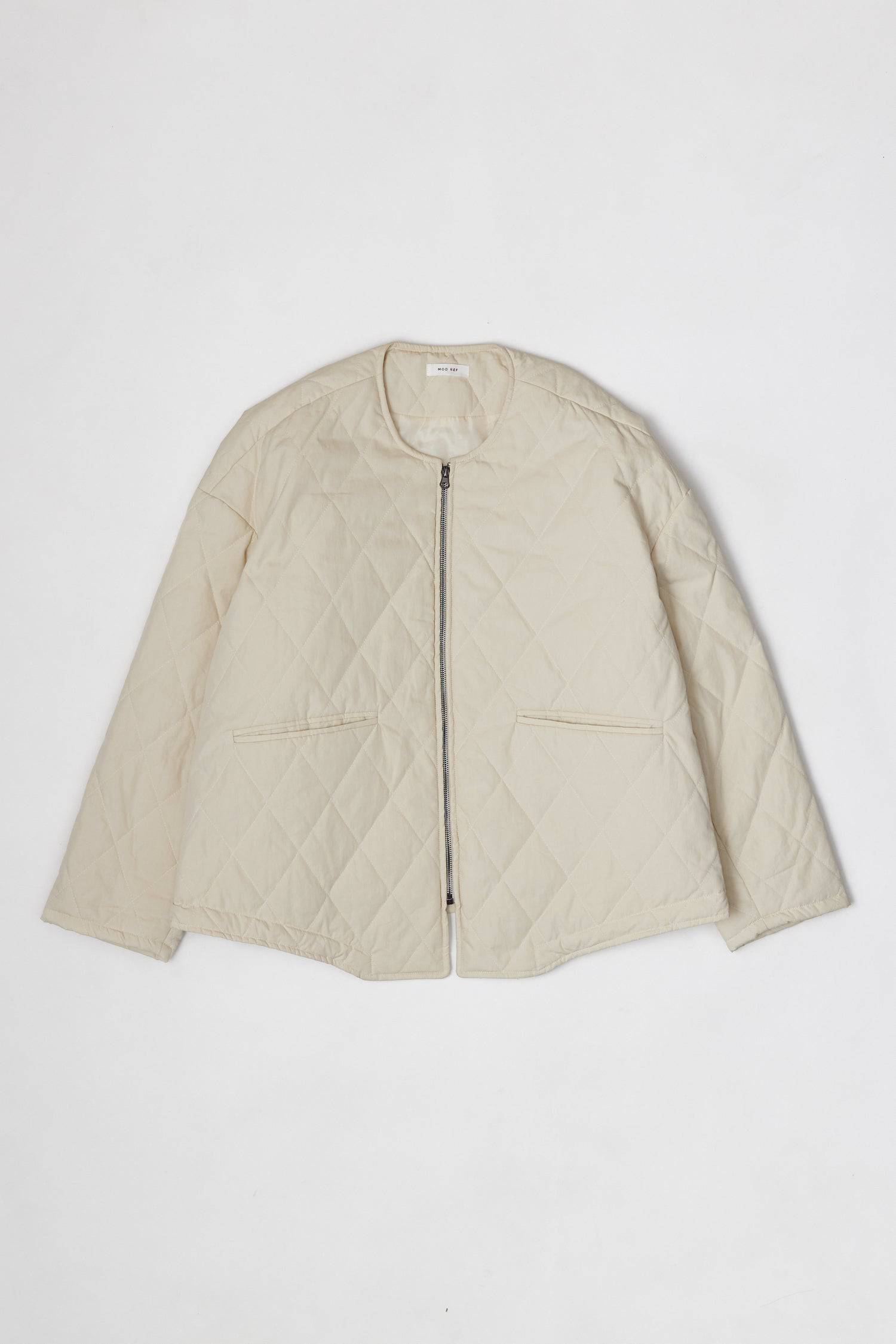 8302377369821, The Greta Jacket, Outerwear, Mod Ref, adjustable,Adjustable Cords,autumn,Black,Buttons,Casual,cf-color-cream,cf-color-olive,cf-color-white,cf-size-l,cf-size-m,cf-size-s,cf-vendor-mod-ref,Comfortable,Cream,Everyday,Fall,Front Pockets,Jacket,Layers,Long Sleeve,mens,mid-autumn,modref,new,Olive,Outerwear,Oversized,Pockets,Quilted,Quilted Jacket,Relaxed,Spring,Summer,tan,Transitional,Unisex,Warm,white,Winter,Women's,Zipper, Information Introducing The Greta Jacket - an oversized quilted jacket tha