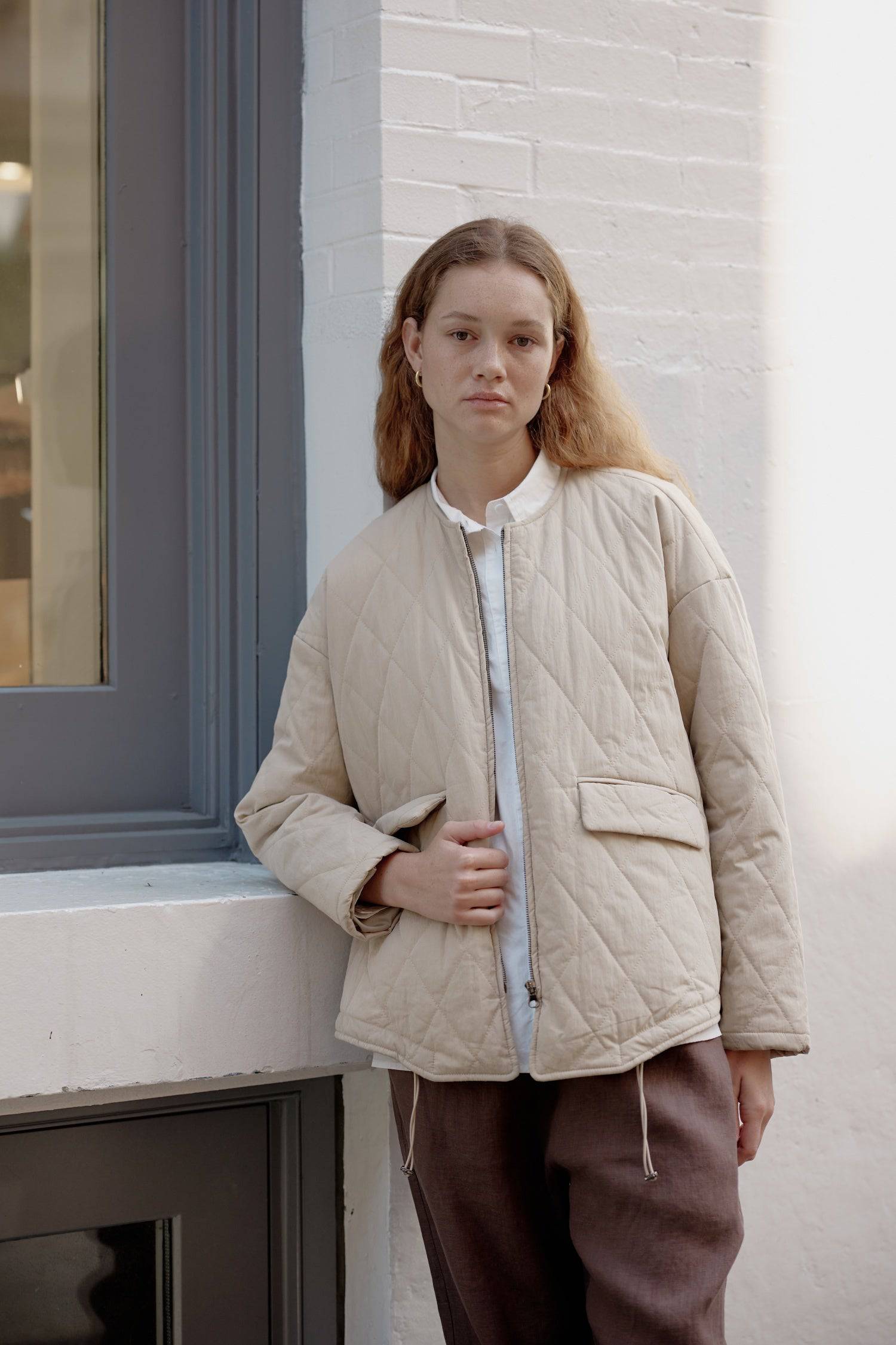 8302377369821, The Greta Jacket, Outerwear, Mod Ref, adjustable,Adjustable Cords,autumn,Black,Buttons,Casual,cf-color-cream,cf-color-olive,cf-color-white,cf-size-l,cf-size-m,cf-size-s,cf-vendor-mod-ref,Comfortable,Cream,Everyday,Fall,Front Pockets,Jacket,Layers,Long Sleeve,mens,mid-autumn,modref,new,Olive,Outerwear,Oversized,Pockets,Quilted,Quilted Jacket,Relaxed,Spring,Summer,tan,Transitional,Unisex,Warm,white,Winter,Women's,Zipper, Information Introducing The Greta Jacket - an oversized quilted jacket tha