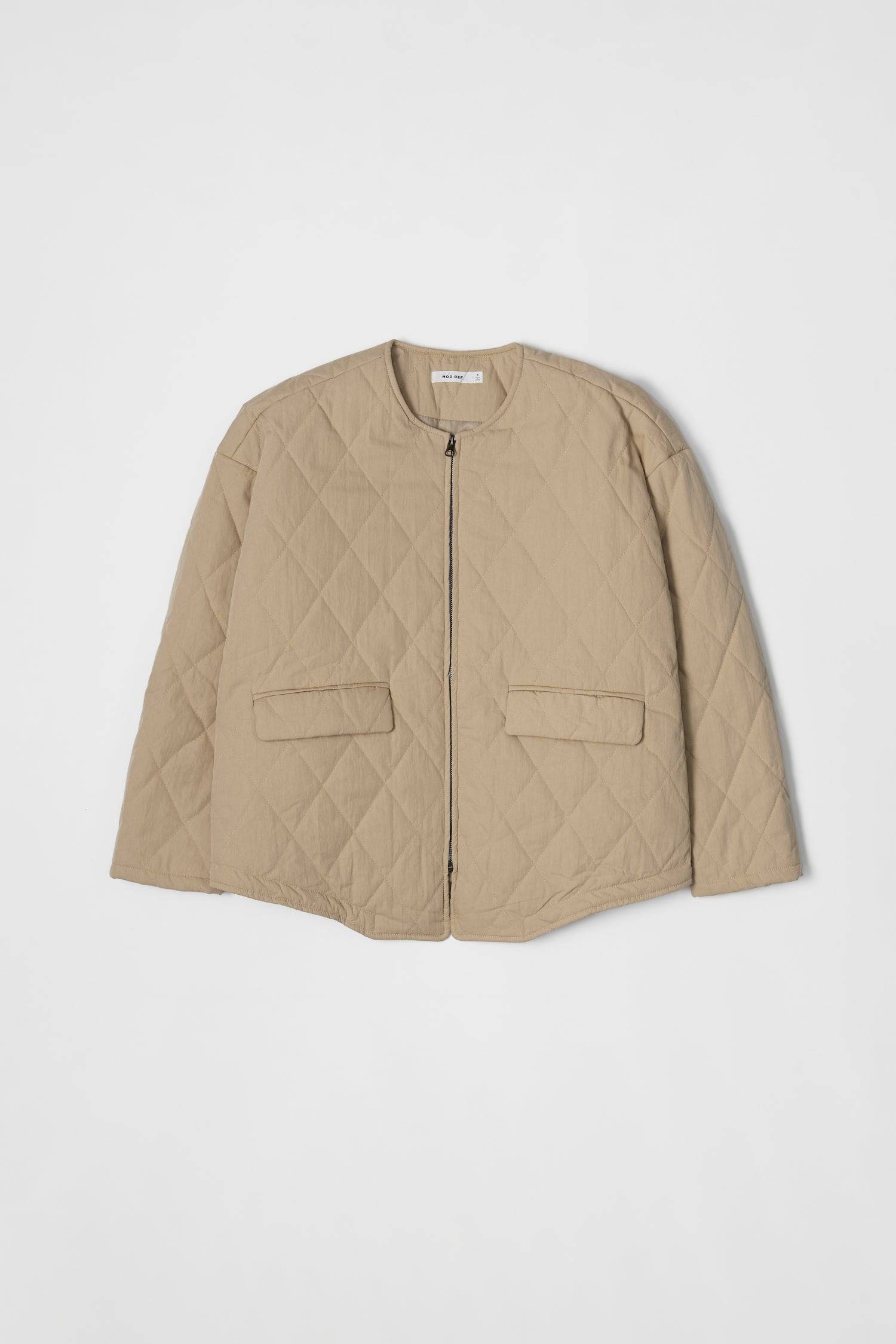 8302377369821, The Greta Jacket, Outerwear, Mod Ref, adjustable,Adjustable Cords,autumn,Black,Buttons,Casual,cf-color-cream,cf-color-olive,cf-color-white,cf-size-l,cf-size-m,cf-size-s,cf-vendor-mod-ref,Comfortable,Cream,Everyday,Fall,Front Pockets,Jacket,Layers,Long Sleeve,mens,mid-autumn,modref,new,Olive,Outerwear,Oversized,Pockets,Quilted,Quilted Jacket,Relaxed,Spring,Summer,tan,Transitional,Unisex,Warm,white,Winter,Women's,Zipper, Information Introducing The Greta Jacket - an oversized quilted jacket tha