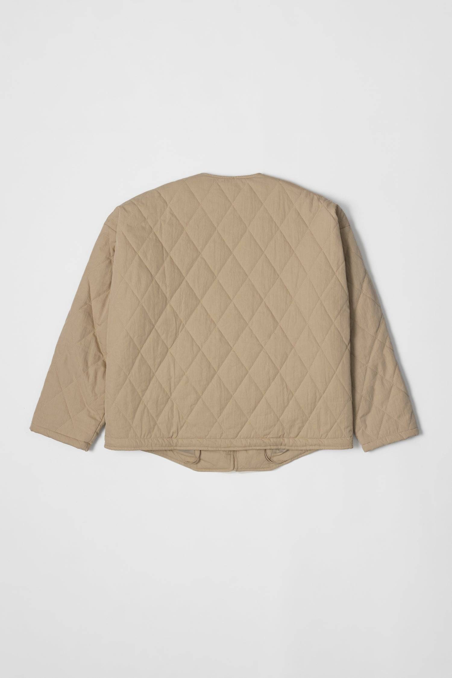 8302377369821, The Greta Jacket, Outerwear, Mod Ref, adjustable,Adjustable Cords,autumn,Black,Buttons,Casual,cf-color-cream,cf-color-olive,cf-color-white,cf-size-l,cf-size-m,cf-size-s,cf-vendor-mod-ref,Comfortable,Cream,Everyday,Fall,Front Pockets,Jacket,Layers,Long Sleeve,mens,mid-autumn,modref,new,Olive,Outerwear,Oversized,Pockets,Quilted,Quilted Jacket,Relaxed,Spring,Summer,tan,Transitional,Unisex,Warm,white,Winter,Women's,Zipper, Information Introducing The Greta Jacket - an oversized quilted jacket tha
