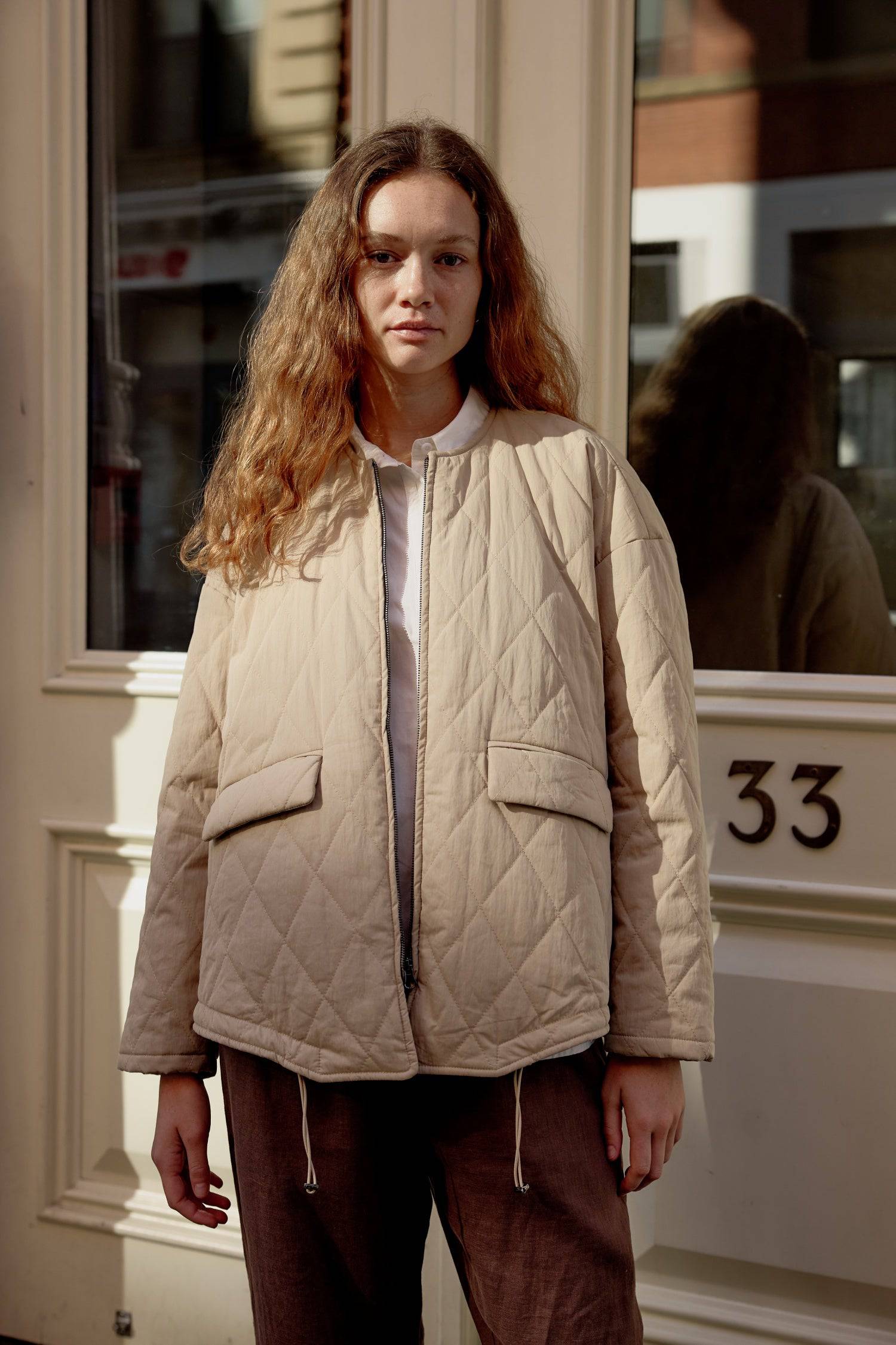 8302377369821, The Greta Jacket, Outerwear, Mod Ref, adjustable,Adjustable Cords,autumn,Black,Buttons,Casual,cf-color-cream,cf-color-olive,cf-color-white,cf-size-l,cf-size-m,cf-size-s,cf-vendor-mod-ref,Comfortable,Cream,Everyday,Fall,Front Pockets,Jacket,Layers,Long Sleeve,mens,mid-autumn,modref,new,Olive,Outerwear,Oversized,Pockets,Quilted,Quilted Jacket,Relaxed,Spring,Summer,tan,Transitional,Unisex,Warm,white,Winter,Women's,Zipper, Information Introducing The Greta Jacket - an oversized quilted jacket tha