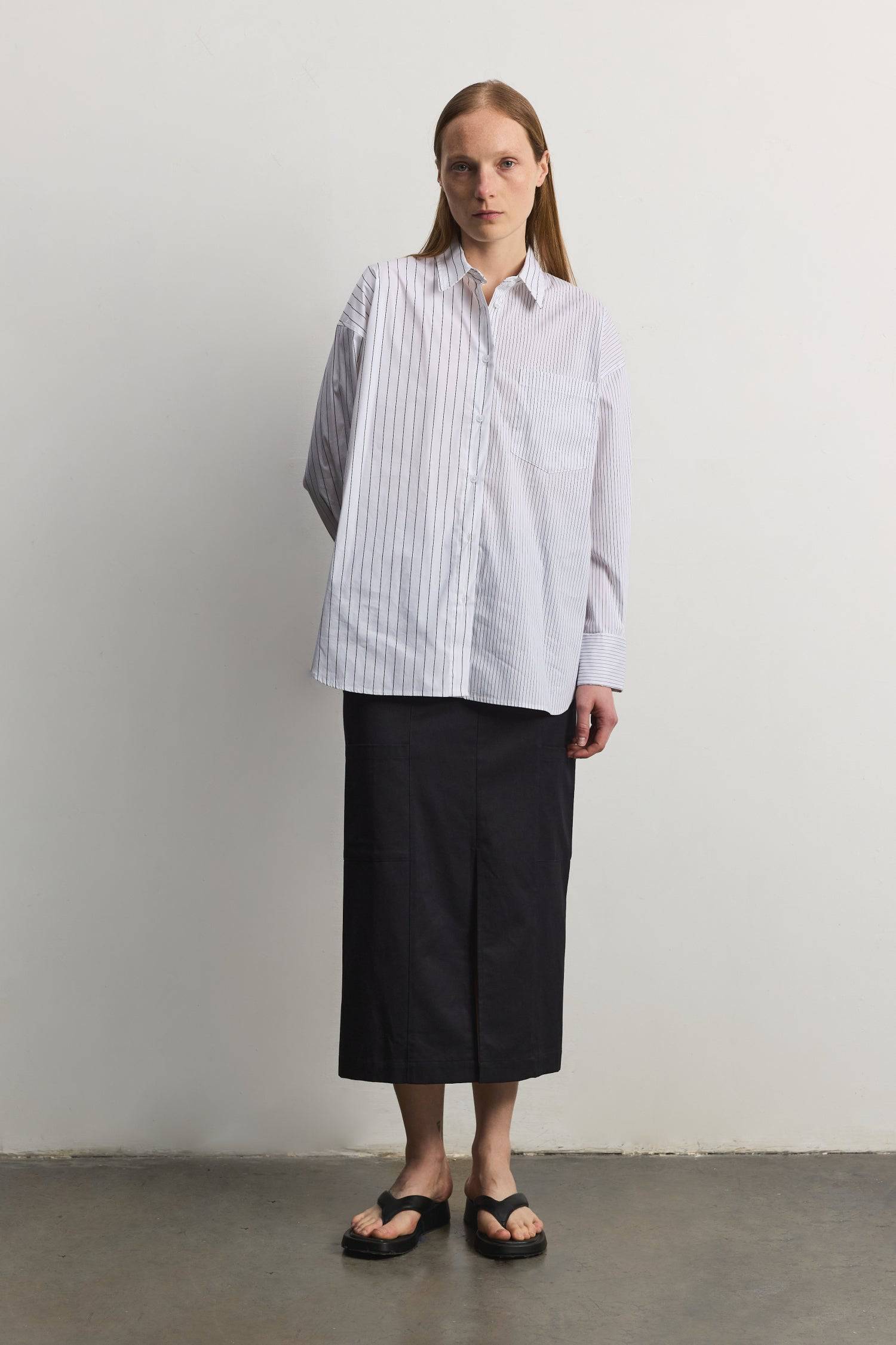 8406215131357, The Maxine Top, Tops, Mod Ref, Black,Breathable,Button down,Button Down Shirt,cf-color-dusty-blue-white,cf-color-white-black,cf-size-l,cf-size-m,cf-size-s,cf-vendor-mod-ref,Chest Pocket,Collared Top,Cotton,everyday,final-sale,finalsale,Long Sleeve,Long Sleeve Top,new,Oversized,Pinstriped,Pinstripes,Pockets,Relaxed,Relaxed Fit,sale,spring,Stripe,Striped,Stripes,Summer,Tops,Transitional,Vertical Stripes,white,womens, Information The Maxine Top is an oversized button-down shirt with a subtle mul