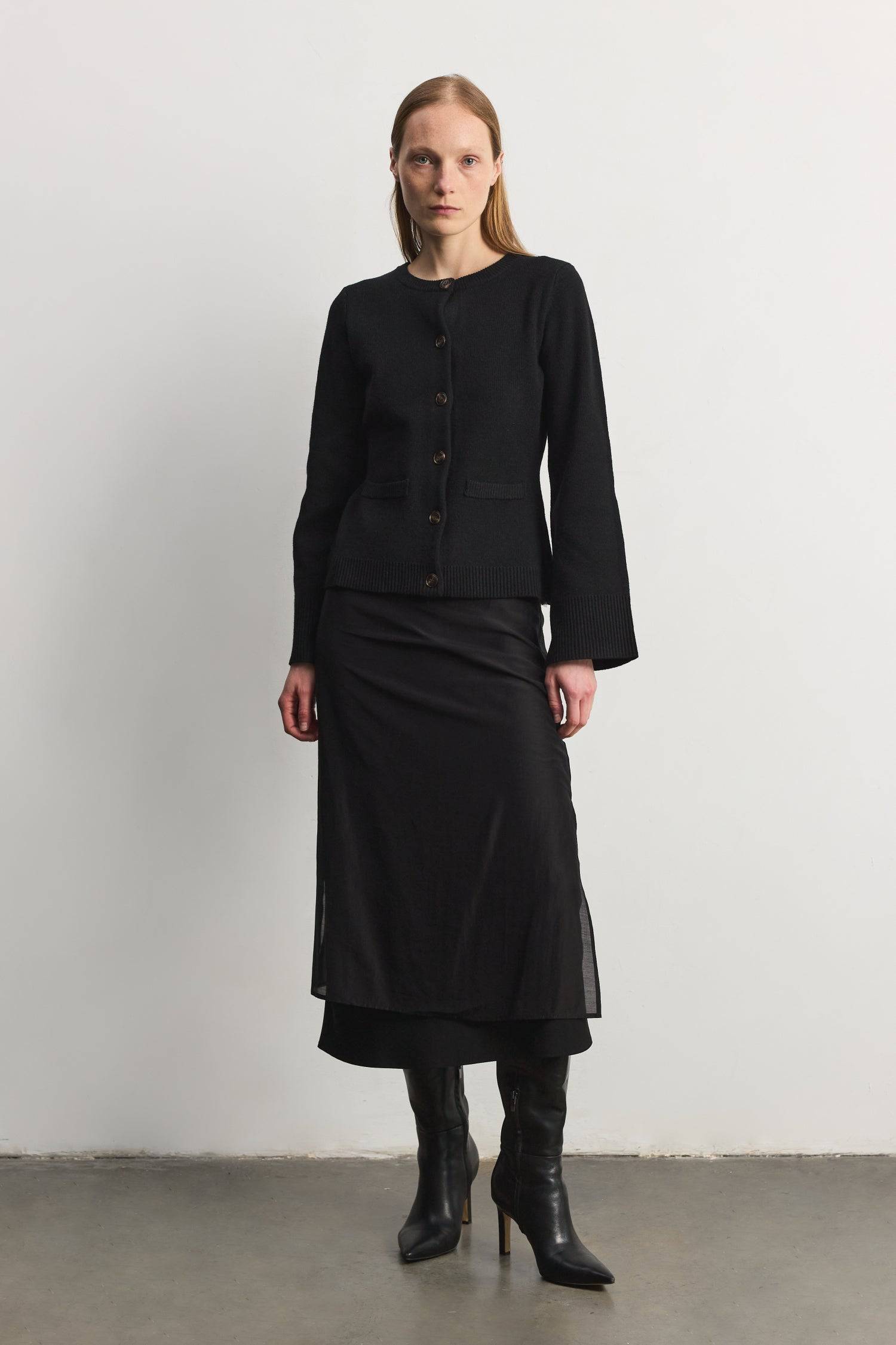 8406224437469, The Tyler Cardigan, Outerwear, Mod Ref, Acrylic,beige,bell sleeves,Black,Button up,Cardigan,Casual,cf-color-beige,cf-color-black,cf-color-oatmeal,cf-size-l,cf-size-m,cf-size-s,cf-size-xl,cf-size-xs,cf-vendor-mod-ref,Colder Seasons,Collar,collared,Cotton,fall,heavy weight,Knit,Matching Set,Mod Ref,modref,new,nylon,Oatmeal,polyester,Pullover,Rib Knit,semi-cropped,set,Sets,shawl,shawl collar,Soft Knit,tonal,Transitional,winter,Women's, Information The Tyler Cardigan features slightly flared slee