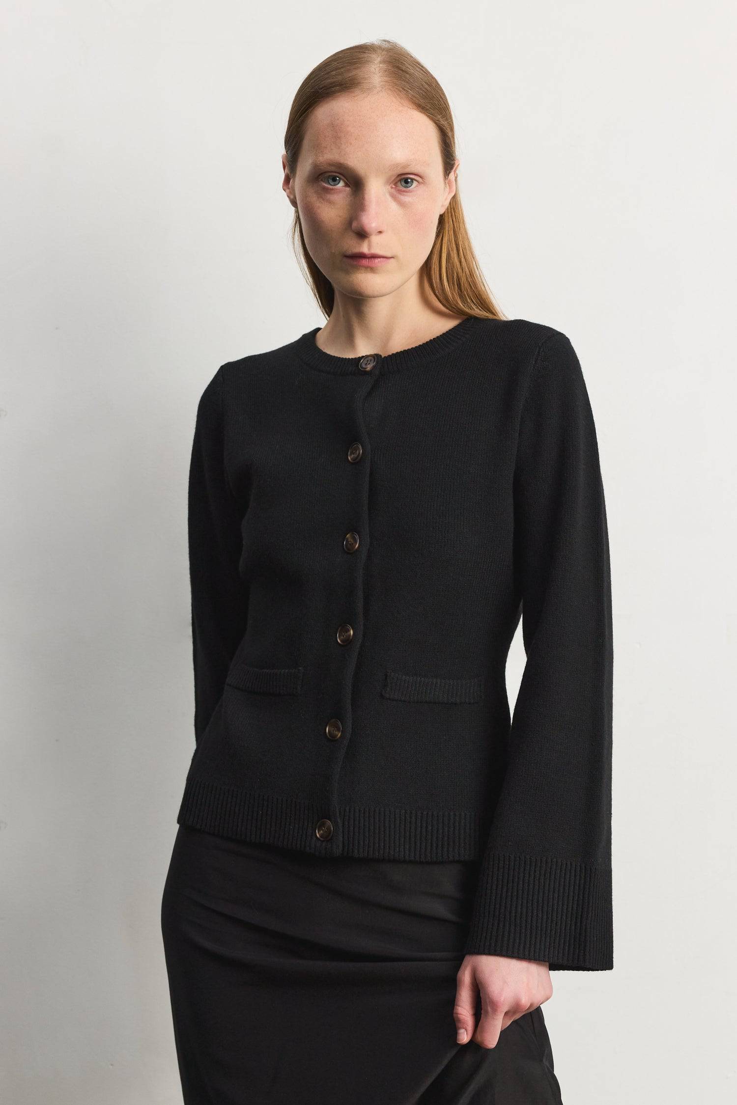 8406224437469, The Tyler Cardigan, Outerwear, Mod Ref, Acrylic,beige,bell sleeves,Black,Button up,Cardigan,Casual,cf-color-beige,cf-color-black,cf-color-oatmeal,cf-size-l,cf-size-m,cf-size-s,cf-size-xl,cf-size-xs,cf-vendor-mod-ref,Colder Seasons,Collar,collared,Cotton,fall,heavy weight,Knit,Matching Set,Mod Ref,modref,new,nylon,Oatmeal,polyester,Pullover,Rib Knit,semi-cropped,set,Sets,shawl,shawl collar,Soft Knit,tonal,Transitional,winter,Women's, Information The Tyler Cardigan features slightly flared slee