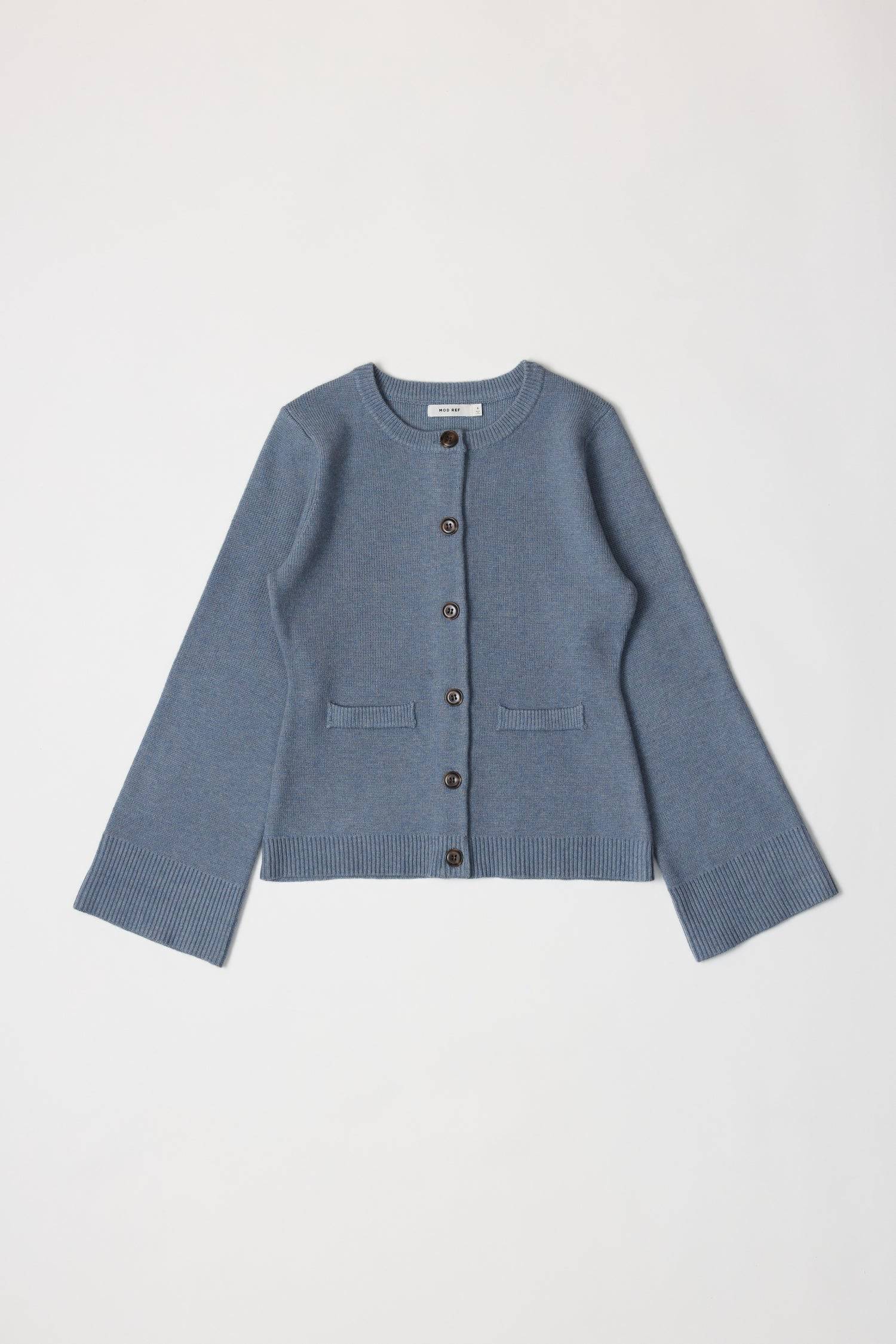 8406224437469, The Tyler Cardigan, Outerwear, Mod Ref, Acrylic,beige,bell sleeves,Black,Button up,Cardigan,Casual,cf-color-beige,cf-color-black,cf-color-oatmeal,cf-size-l,cf-size-m,cf-size-s,cf-size-xl,cf-size-xs,cf-vendor-mod-ref,Colder Seasons,Collar,collared,Cotton,fall,heavy weight,Knit,Matching Set,Mod Ref,modref,new,nylon,Oatmeal,polyester,Pullover,Rib Knit,semi-cropped,set,Sets,shawl,shawl collar,Soft Knit,tonal,Transitional,winter,Women's, Information The Tyler Cardigan features slightly flared slee