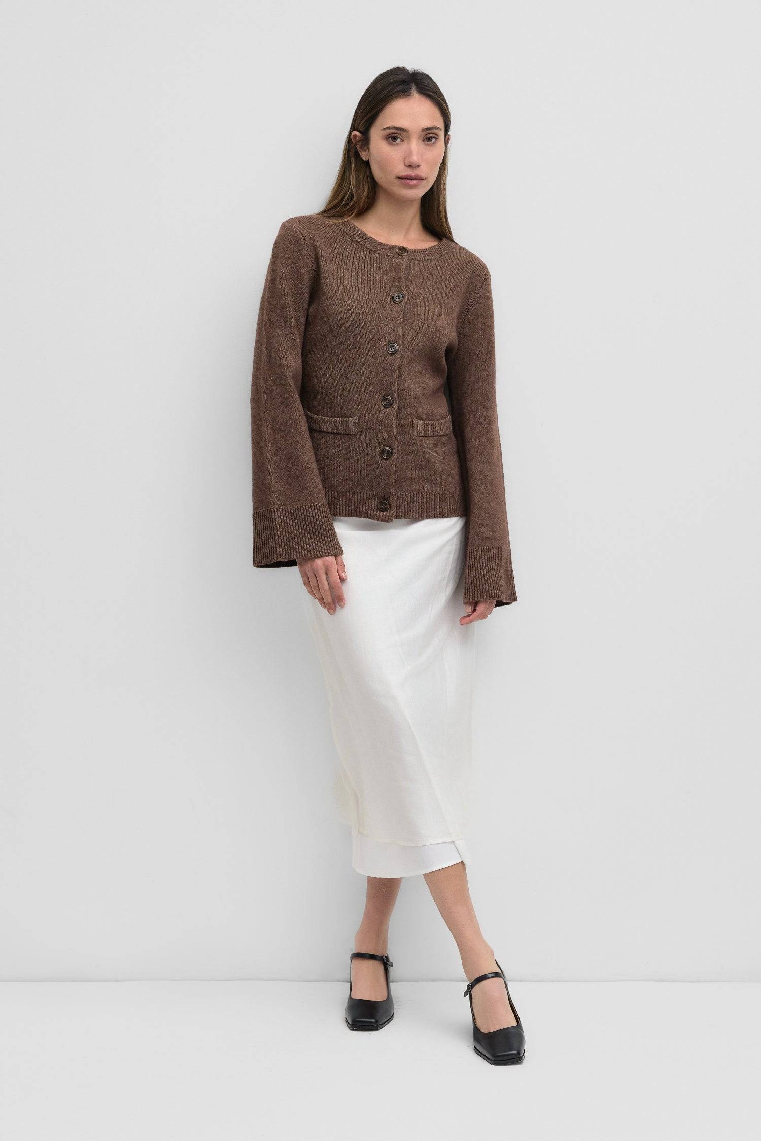 8406224437469, The Tyler Cardigan, Outerwear, Mod Ref, Acrylic,beige,bell sleeves,Black,Button up,Cardigan,Casual,cf-color-beige,cf-color-black,cf-color-oatmeal,cf-size-l,cf-size-m,cf-size-s,cf-size-xl,cf-size-xs,cf-vendor-mod-ref,Colder Seasons,Collar,collared,Cotton,fall,heavy weight,Knit,Matching Set,Mod Ref,modref,new,nylon,Oatmeal,polyester,Pullover,Rib Knit,semi-cropped,set,Sets,shawl,shawl collar,Soft Knit,tonal,Transitional,winter,Women's, Information The Tyler Cardigan features slightly flared slee