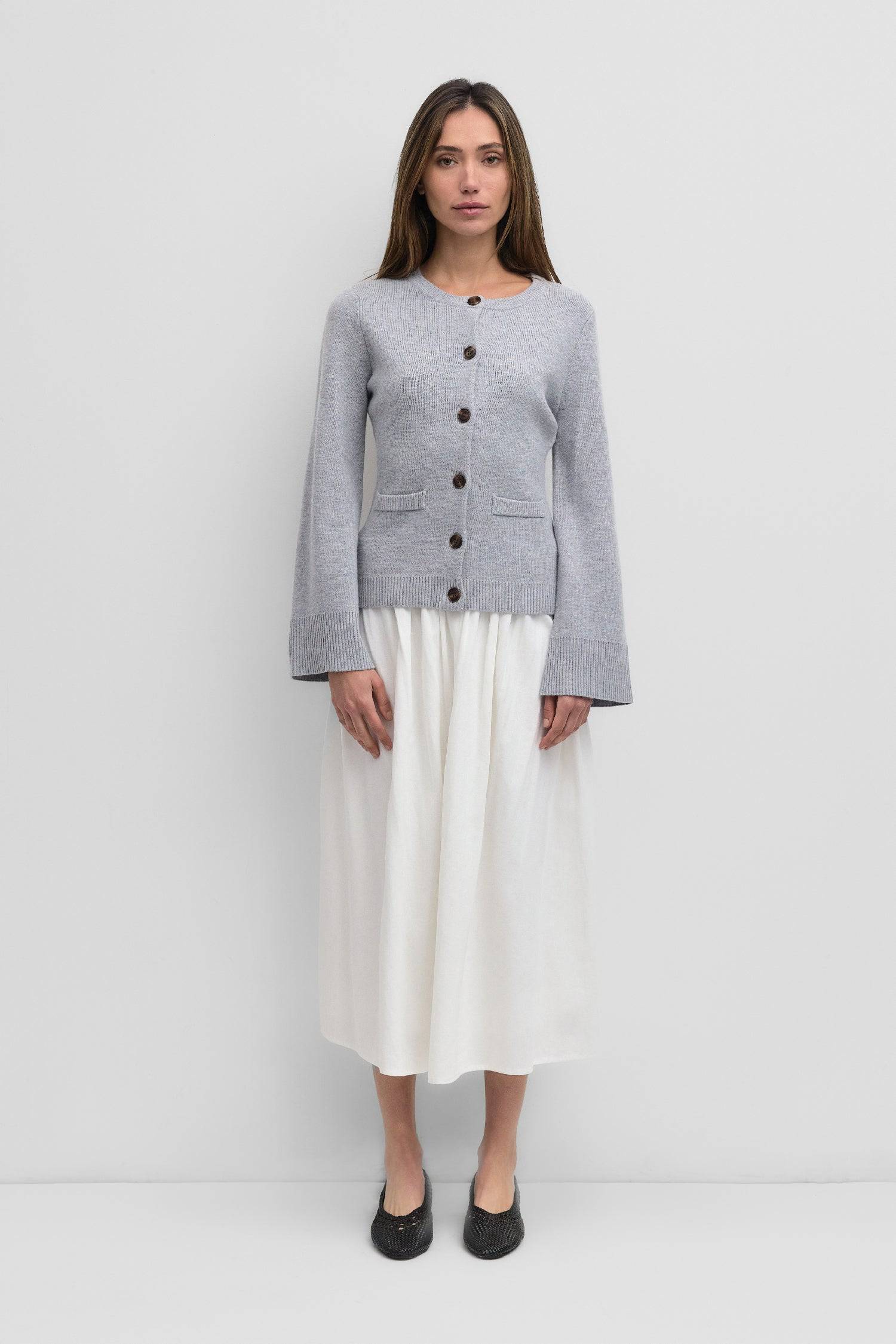 8406224437469, The Tyler Cardigan, Outerwear, Mod Ref, Acrylic,beige,bell sleeves,Black,Button up,Cardigan,Casual,cf-color-beige,cf-color-black,cf-color-oatmeal,cf-size-l,cf-size-m,cf-size-s,cf-size-xl,cf-size-xs,cf-vendor-mod-ref,Colder Seasons,Collar,collared,Cotton,fall,heavy weight,Knit,Matching Set,Mod Ref,modref,new,nylon,Oatmeal,polyester,Pullover,Rib Knit,semi-cropped,set,Sets,shawl,shawl collar,Soft Knit,tonal,Transitional,winter,Women's, Information The Tyler Cardigan features slightly flared slee