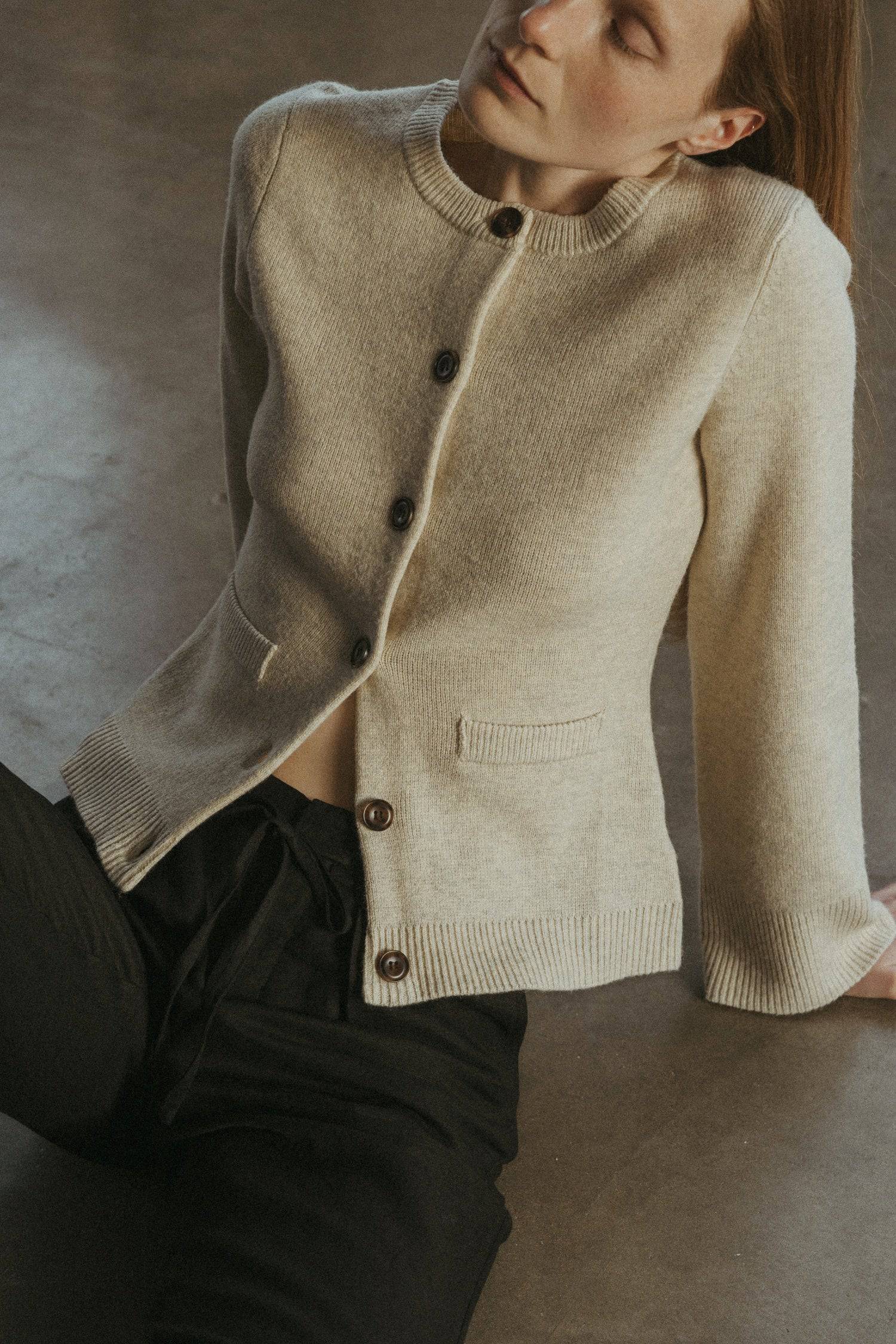 8406224437469, The Tyler Cardigan, Outerwear, Mod Ref, Acrylic,beige,bell sleeves,Black,Button up,Cardigan,Casual,cf-color-beige,cf-color-black,cf-color-oatmeal,cf-size-l,cf-size-m,cf-size-s,cf-size-xl,cf-size-xs,cf-vendor-mod-ref,Colder Seasons,Collar,collared,Cotton,fall,heavy weight,Knit,Matching Set,Mod Ref,modref,new,nylon,Oatmeal,polyester,Pullover,Rib Knit,semi-cropped,set,Sets,shawl,shawl collar,Soft Knit,tonal,Transitional,winter,Women's, Information The Tyler Cardigan features slightly flared slee