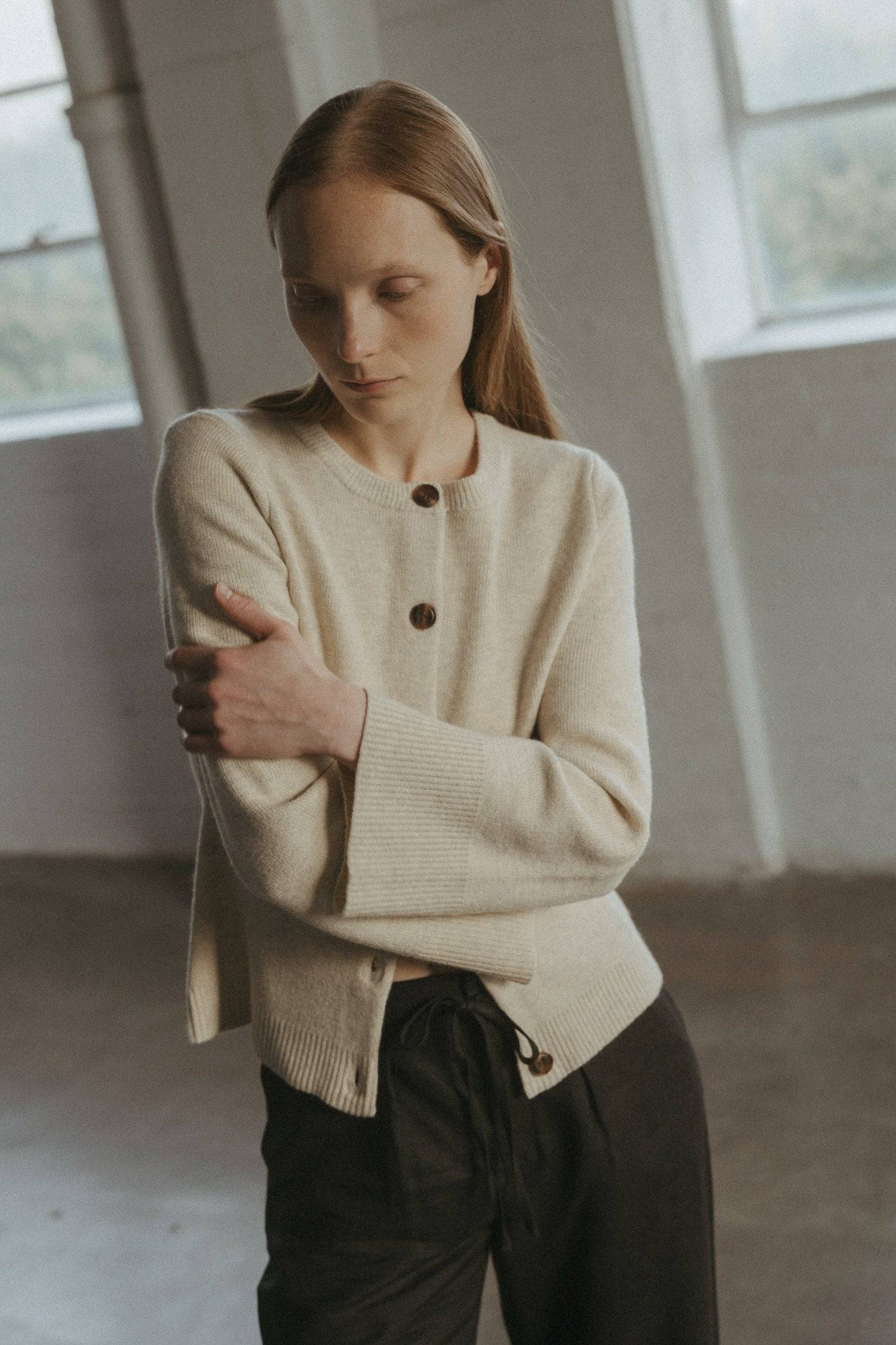 8406224437469, The Tyler Cardigan, Outerwear, Mod Ref, Acrylic,beige,bell sleeves,Black,Button up,Cardigan,Casual,cf-color-beige,cf-color-black,cf-color-oatmeal,cf-size-l,cf-size-m,cf-size-s,cf-size-xl,cf-size-xs,cf-vendor-mod-ref,Colder Seasons,Collar,collared,Cotton,fall,heavy weight,Knit,Matching Set,Mod Ref,modref,new,nylon,Oatmeal,polyester,Pullover,Rib Knit,semi-cropped,set,Sets,shawl,shawl collar,Soft Knit,tonal,Transitional,winter,Women's, Information The Tyler Cardigan features slightly flared slee