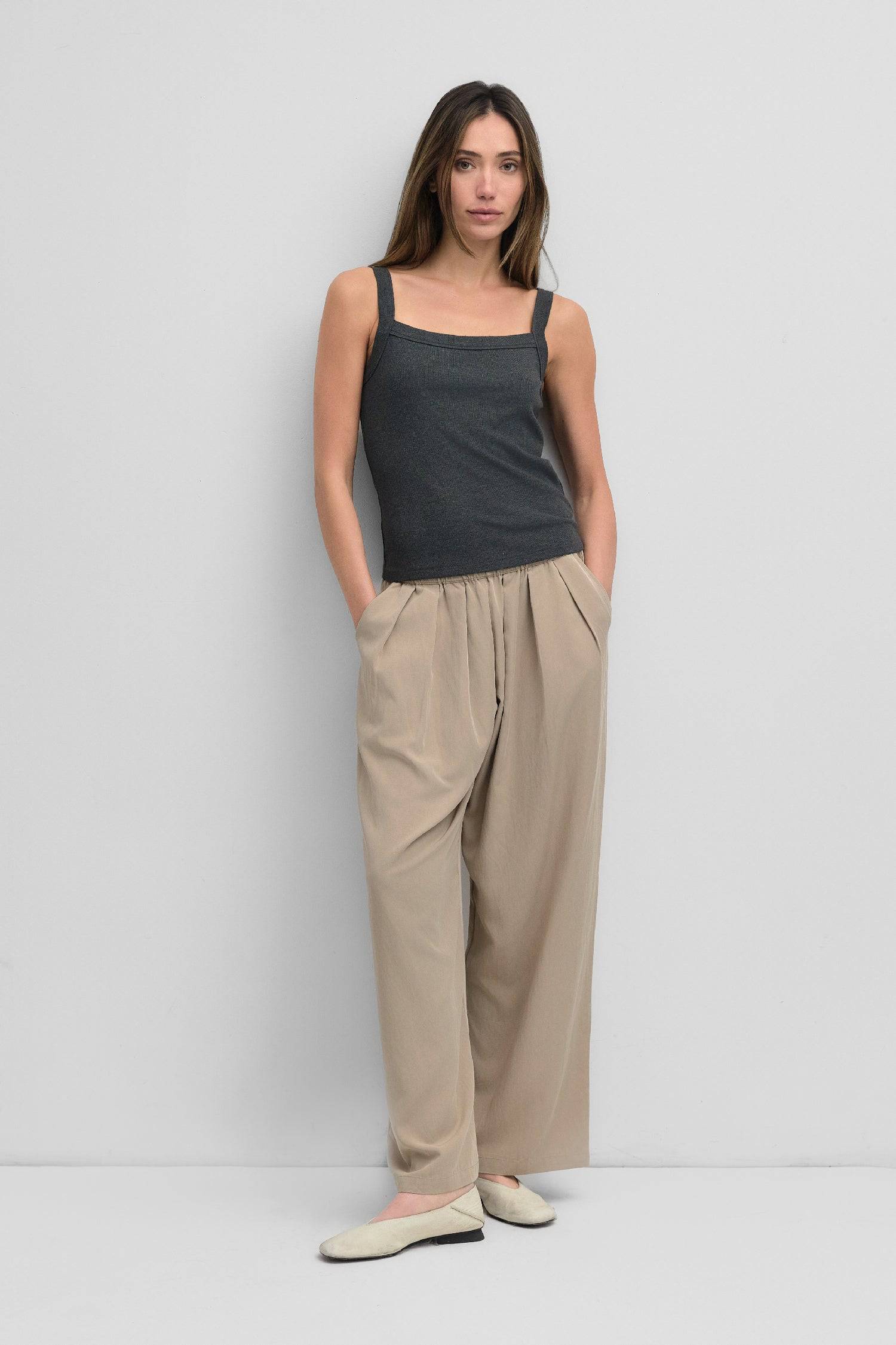 8677887049949, The Shay Tank Top, Tops, Mod Ref, Casual,cf-color-charcoal,cf-color-cream,cf-size-l,cf-size-m,cf-size-s,Charcoal,Cream,Crop Top,Everyday,Fitted,Form Fitting,Midi,Ribbed Top,slim fit,Slit,Square Neckline,Squared Neckline,stretch,Stretchy,Summer,tank,Tank Top,top,Tops,Womens, Information The Shay Tank Top is your new wardrobe staple, featuring a fitted bodice and a stylish square neckline for a contemporary look. The ribbed knit adds texture, while the scooped back neck detail adds a touch of f