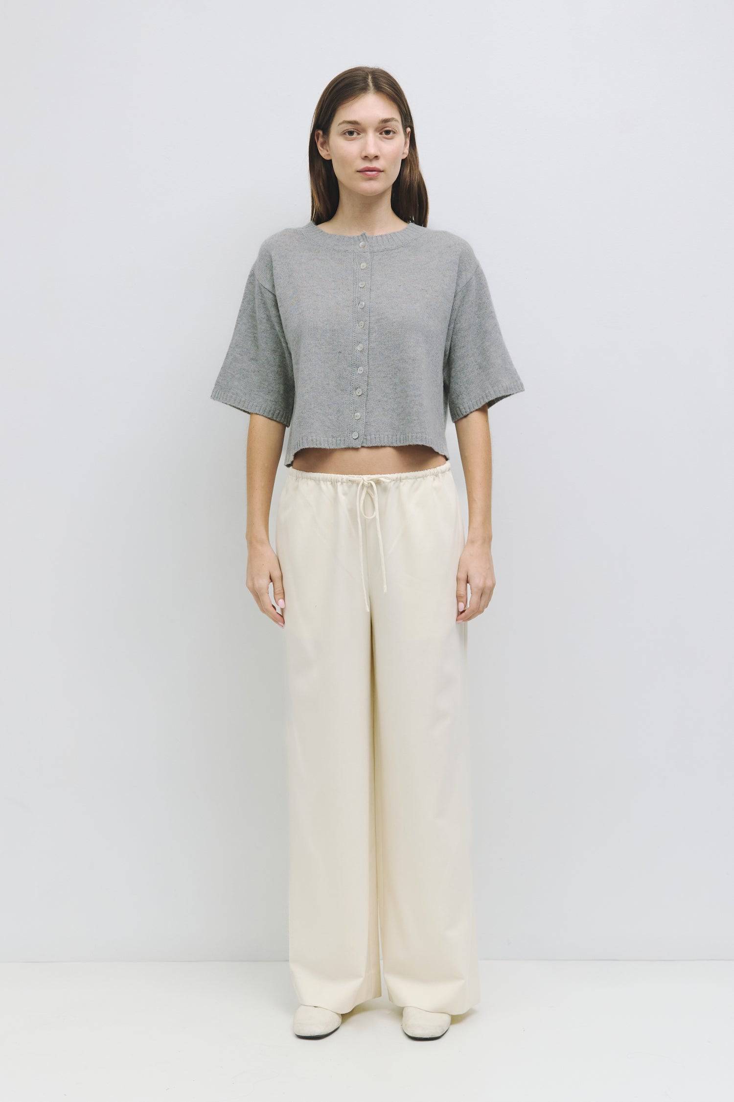 8911743090909, The Stacey Cardigan, Tops, Mod Ref, All Row,allrow,Basic,Basics,Blue,Cardigan,Casual,cf-color-blue,cf-color-cream,cf-color-grey,cf-size-l,cf-size-m,cf-size-s,Comfortable,Cream,Crew Neck,Crop,Cropped,cropped hemline,Everyday,Grey,Heather Grey,Light Blue,longsleeve,Matching Set,new,set,Sets,Shell Buttons,Short Sleeve,Spring,stretch,Transitional,Womens,womens top,Wool,wool blend, Information The Stacey Cardigan is a lightweight, half-sleeve cardigan with a relaxed fit, ideal for layering over to