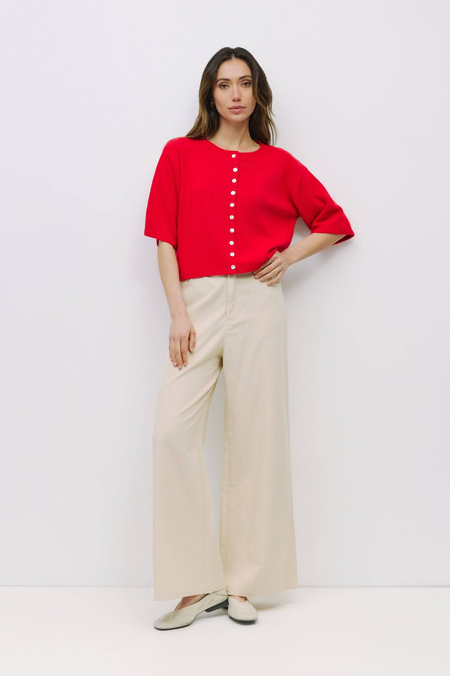 8911743090909, The Stacey Cardigan, Tops, Mod Ref, All Row,allrow,Basic,Basics,Blue,Cardigan,Casual,cf-color-blue,cf-color-cream,cf-color-grey,cf-size-l,cf-size-m,cf-size-s,Comfortable,Cream,Crew Neck,Crop,Cropped,cropped hemline,Everyday,Grey,Heather Grey,Light Blue,longsleeve,Matching Set,new,set,Sets,Shell Buttons,Short Sleeve,Spring,stretch,Transitional,Womens,womens top,Wool,wool blend, Information The Stacey Cardigan is a lightweight, half-sleeve cardigan with a relaxed fit, ideal for layering over to